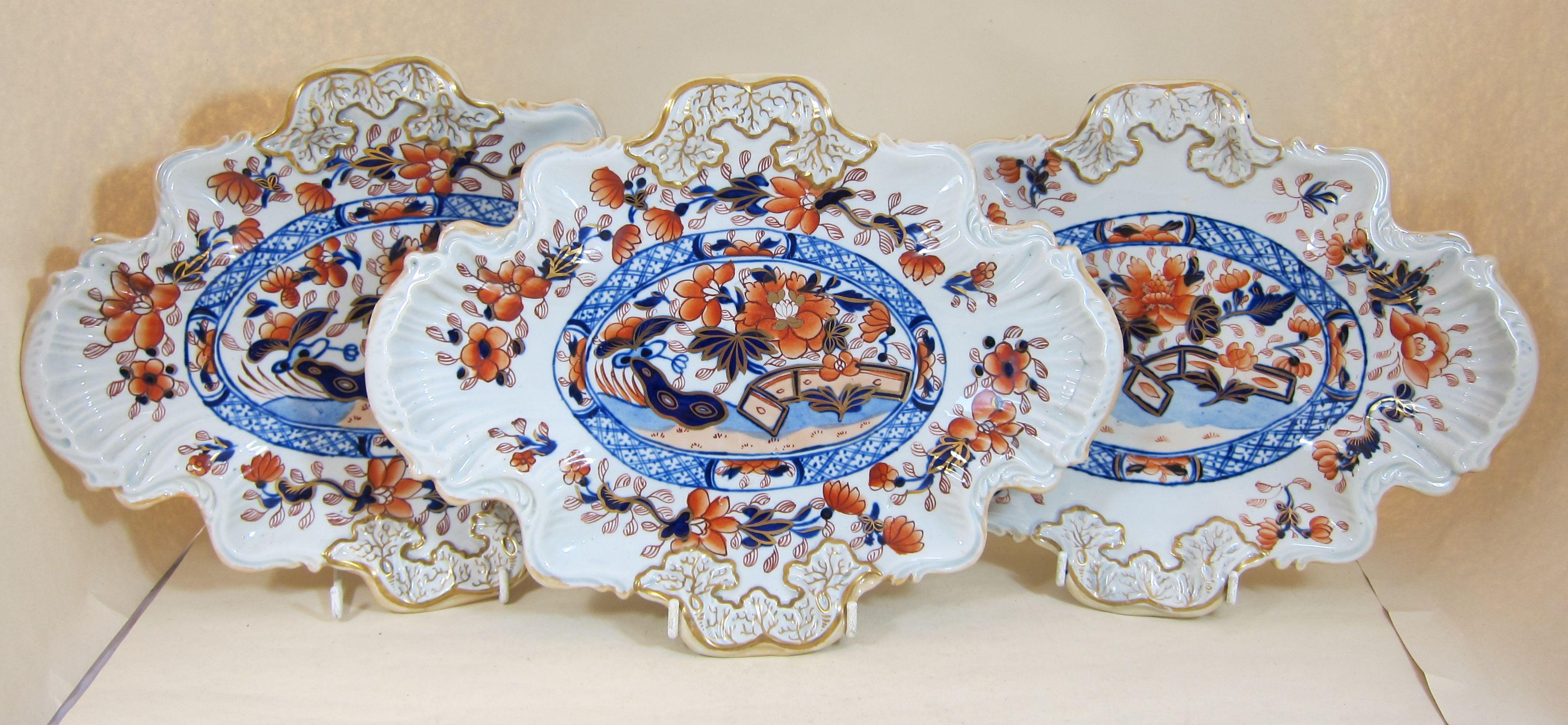 Three Masons Ironstone dishes with fence and floral decoration.