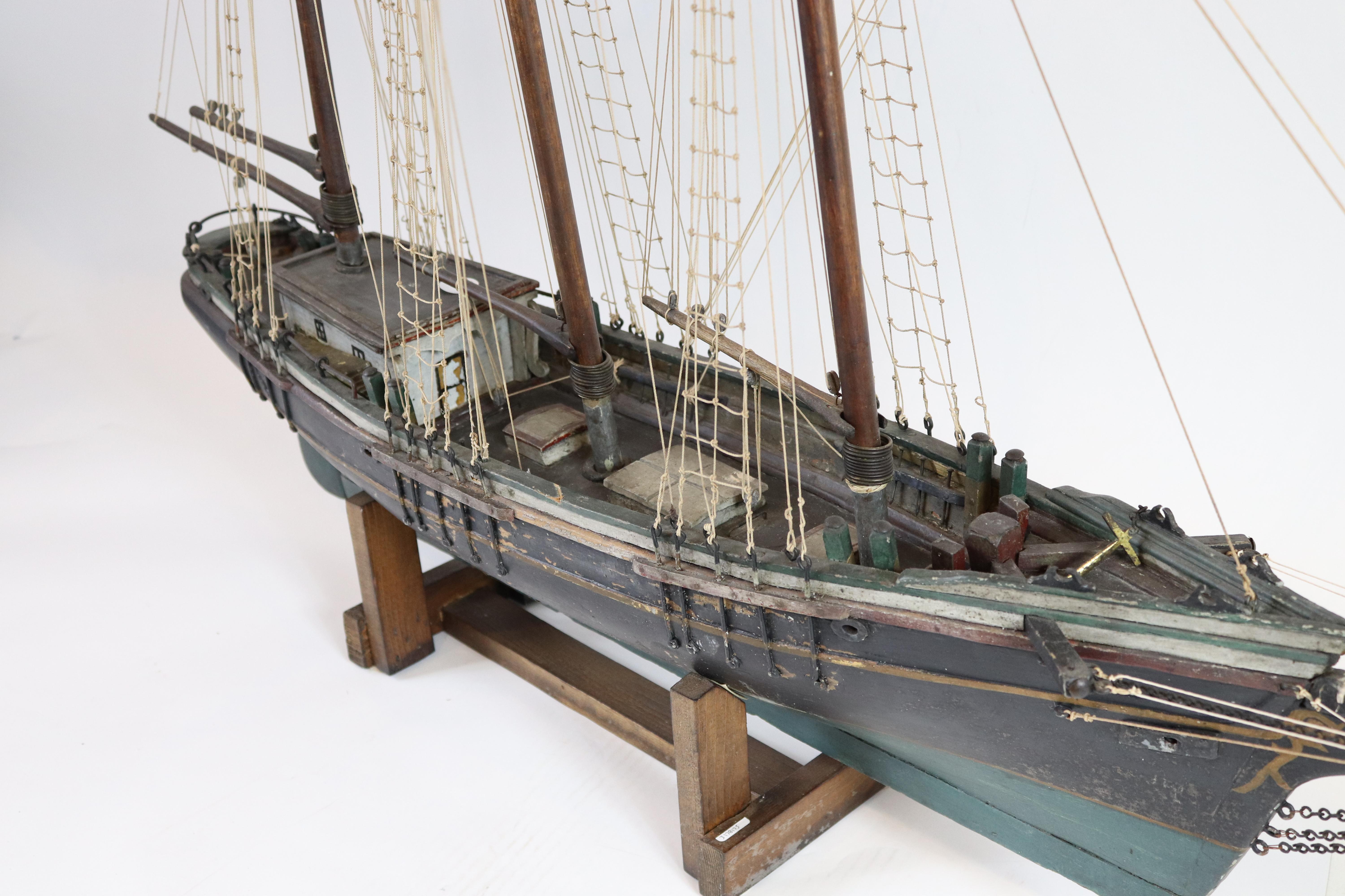 Classic antique merchant schooner with old paint. Details include hatches, cabins, etc., measure: 53 x 20 x 44.