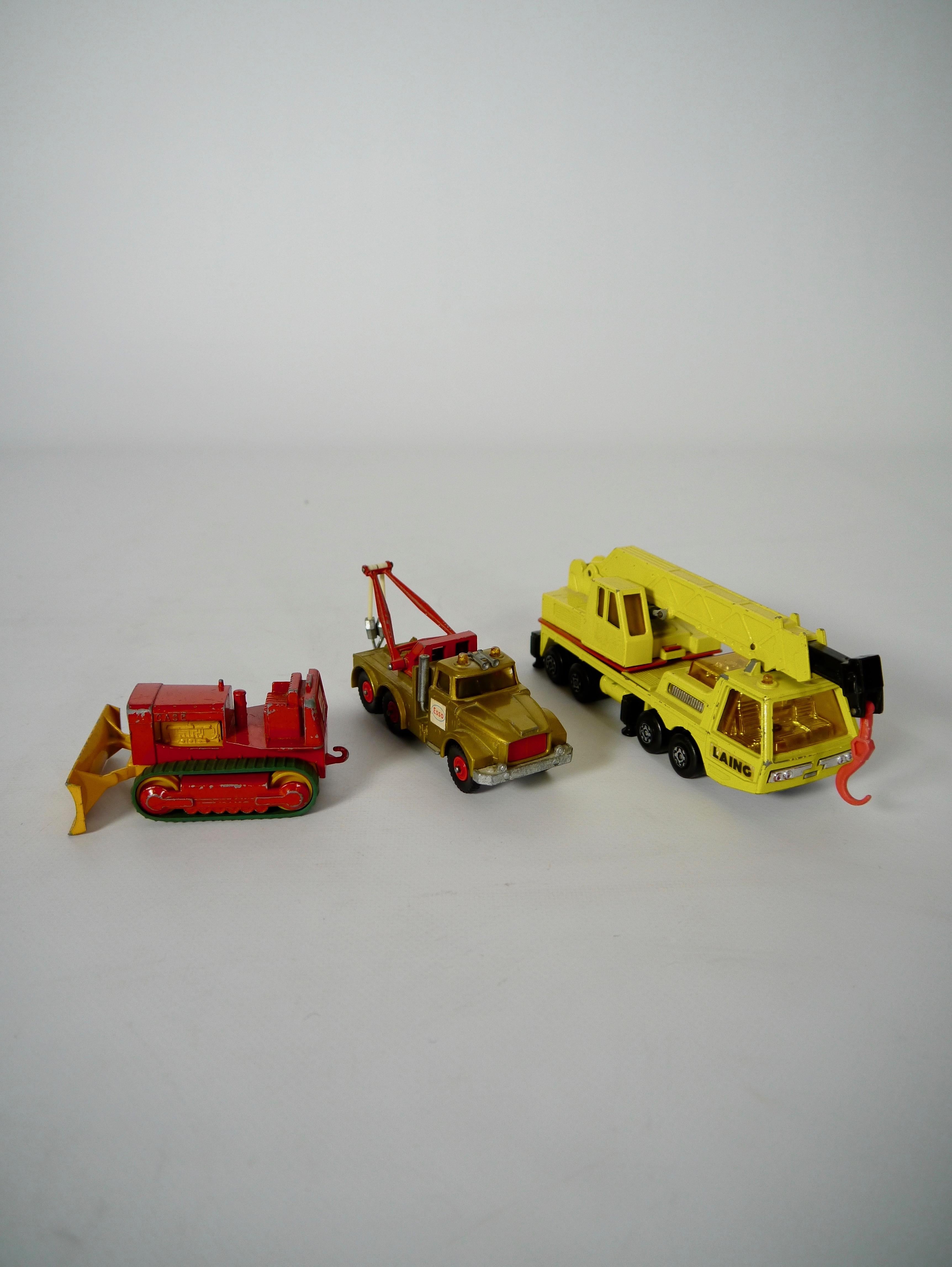 Three matchbox construction machine toys; Scammel Heavy Wreck Truck, K12 Hercules Mobile Crane & Case Tractor. All made by Lesney in the 60s-70s. Very good condition.