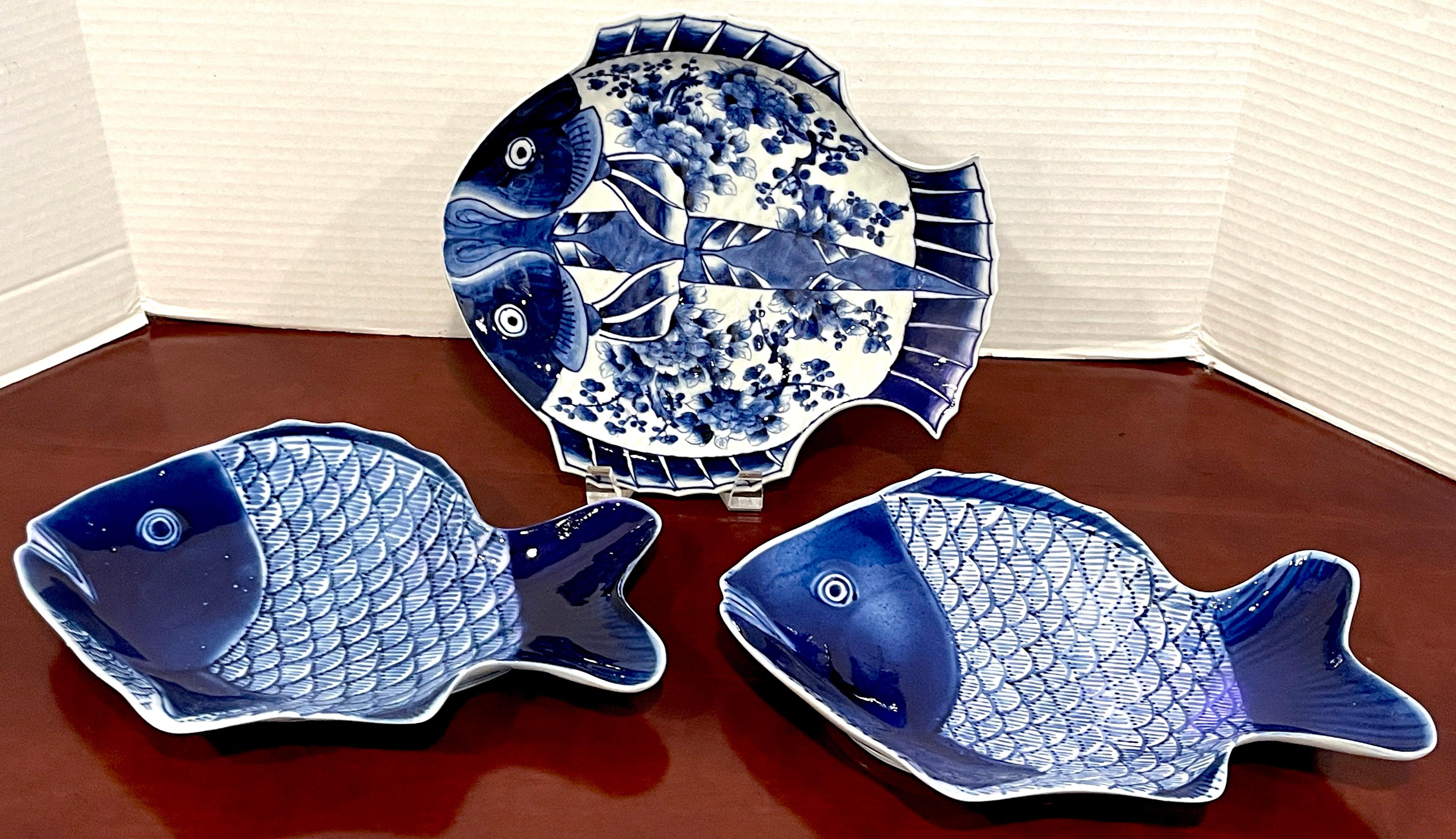 Three Meiji Period Fukagawa blue & white fish plates.
Japan Circa 1900s
A three piece collection consisting of one rare two headed blue and white signed Fukagawa fish plate measuring 11 inches-wide x 10-inches high
Two similar blue and white fish