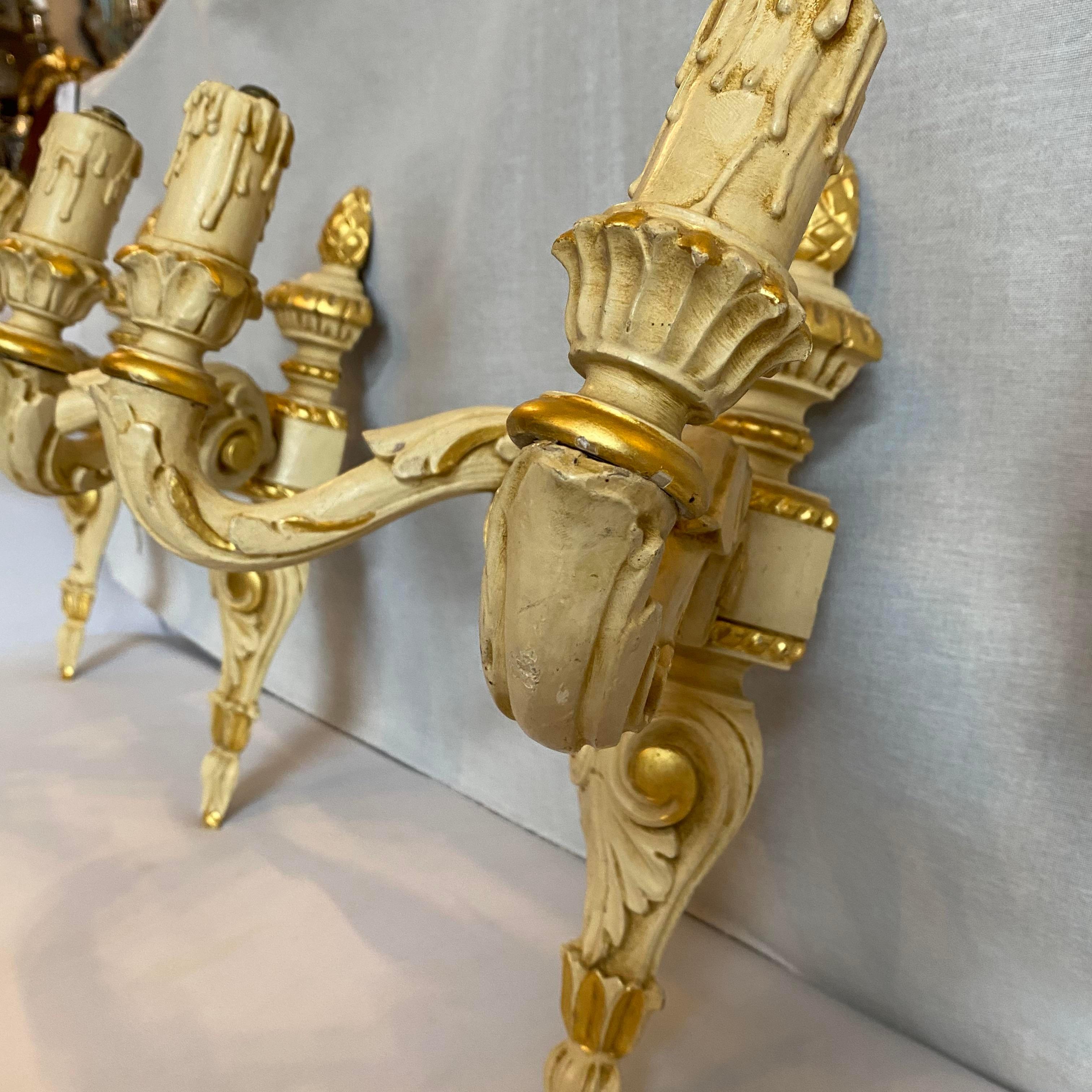 Giltwood Three Mid-20th Century Ivory and Gold Lacquered Wood Italian Wall Lights For Sale