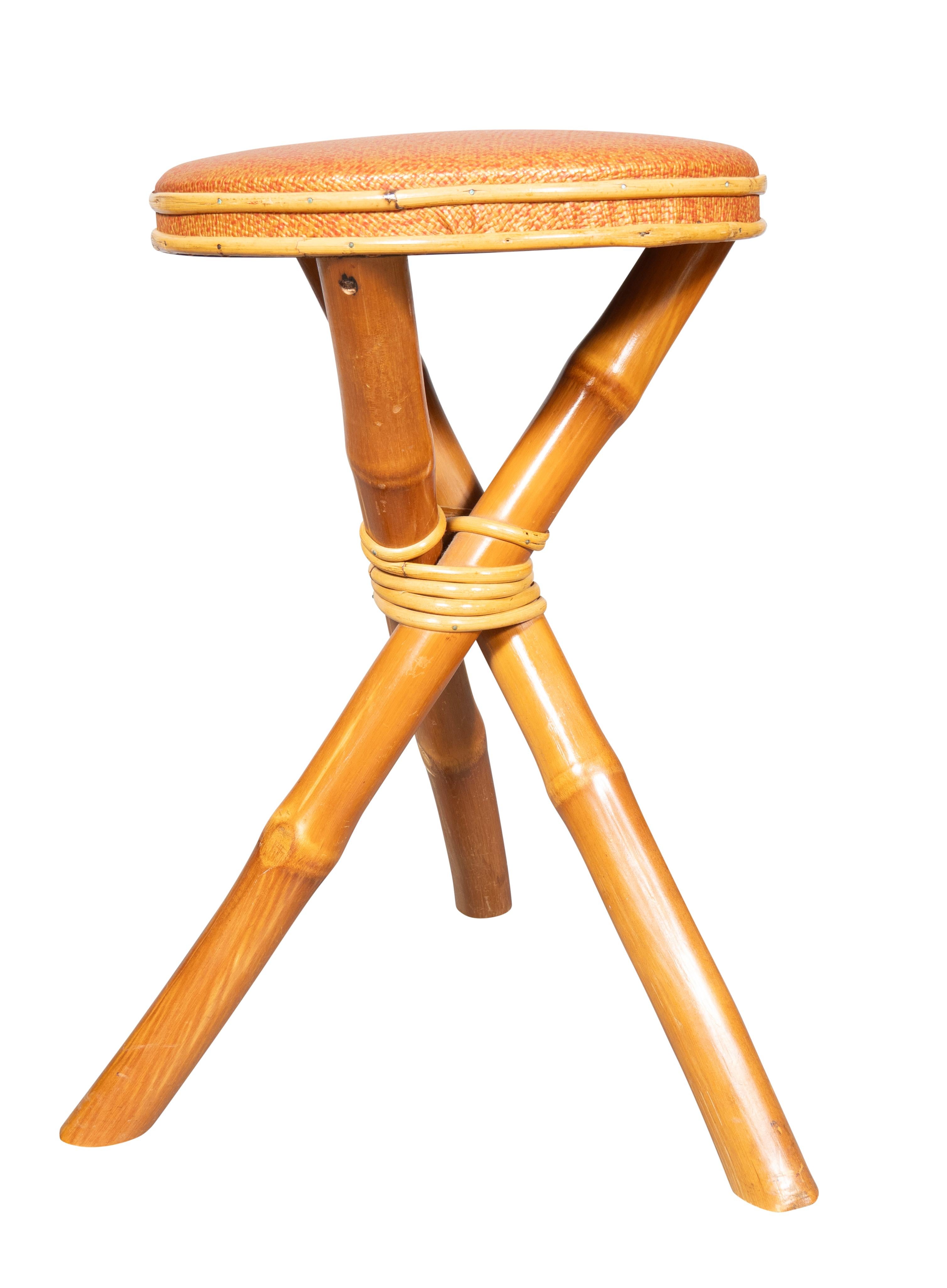 Seat 14.5 diameter. With a maker from Lantana Florida on the underside. Very stable with three bamboo legs and round padded seat. Dated 1954.