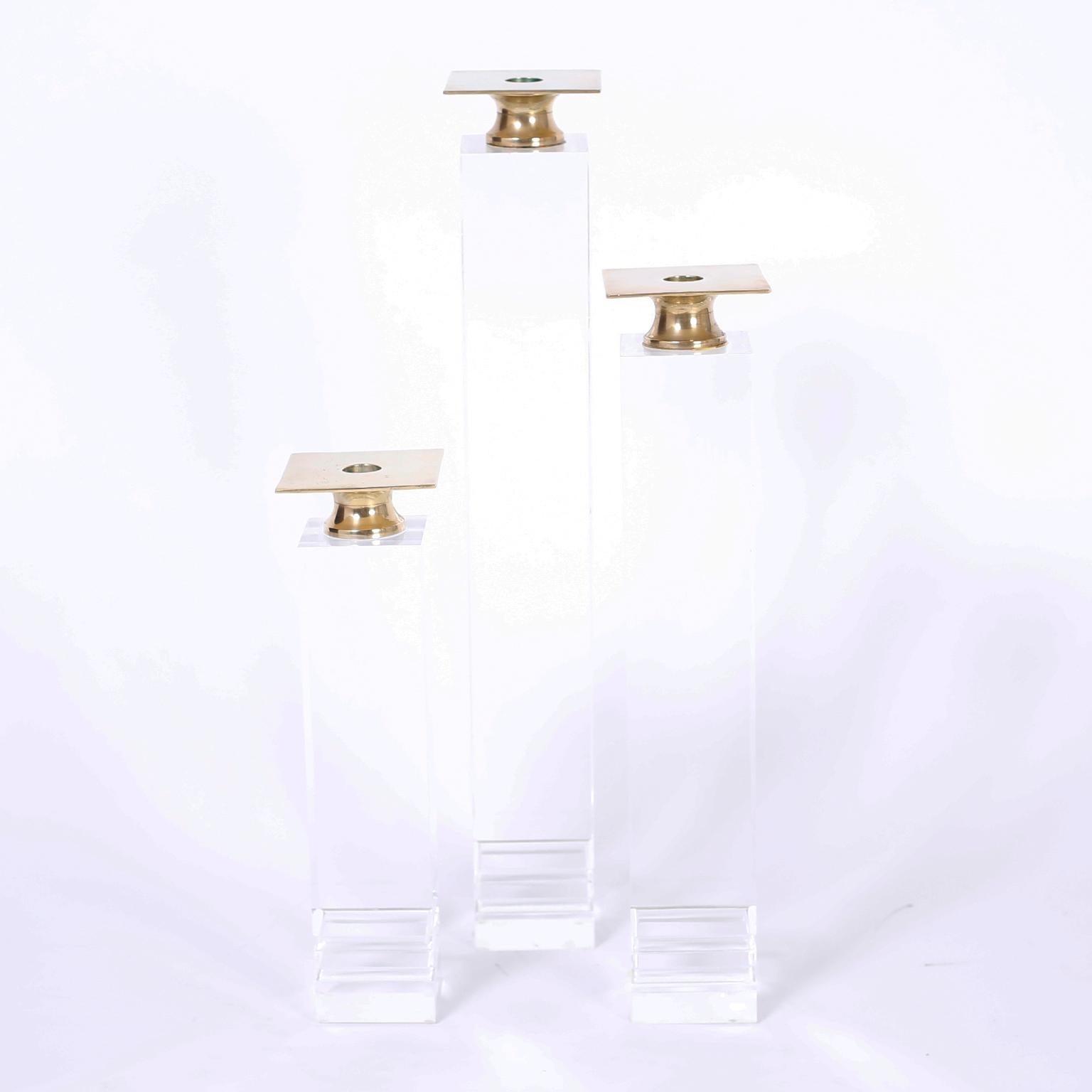 American Three Midcentury Lucite and Brass Candlesticks For Sale