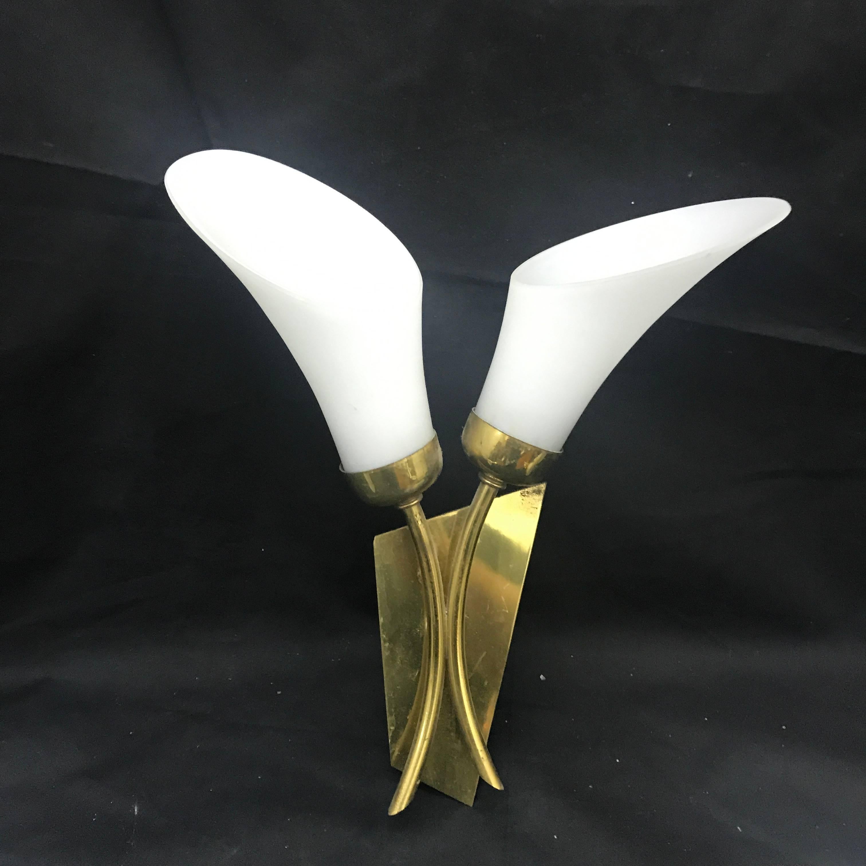 Brass and white glass wall sconces, made in Italy in the 1950s, good conditions overall. They work both 110-240 volts and need two regular e 14 bulbs, price is for one sconce.