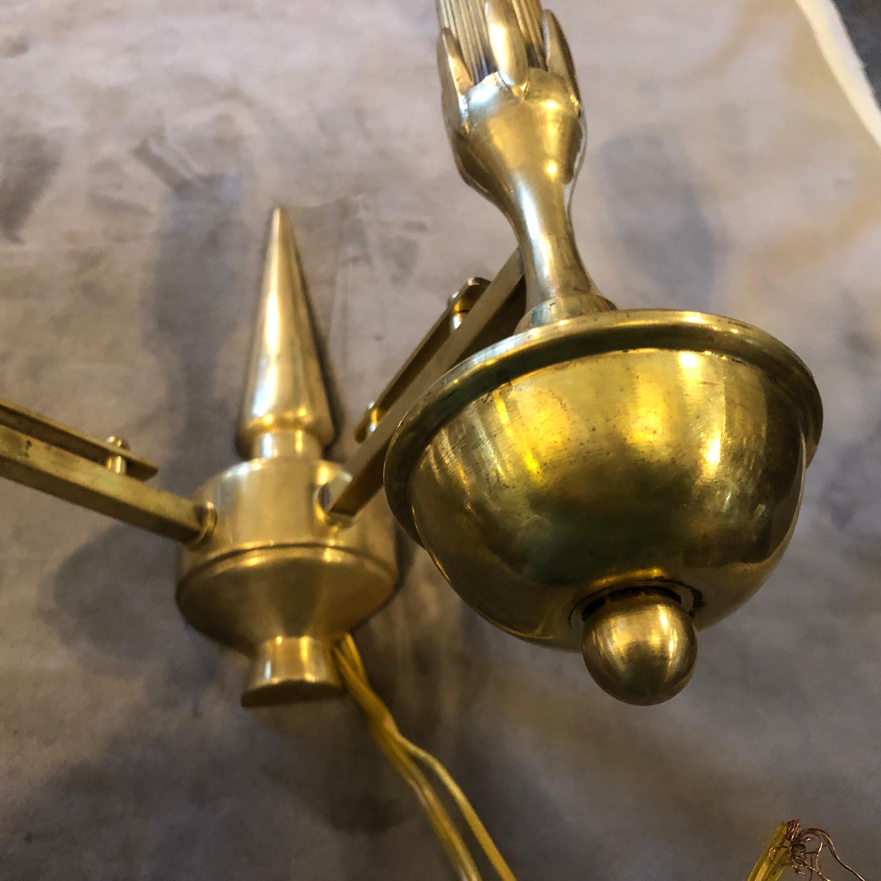 Three original patina solid brass wall sconces made in Italy in the Forties. Good conditions overall, they work 110-240 volts and need regular e14 bulbs. Price is for one sconce. The Wall Sconces are elegant and sophisticated lighting fixtures that