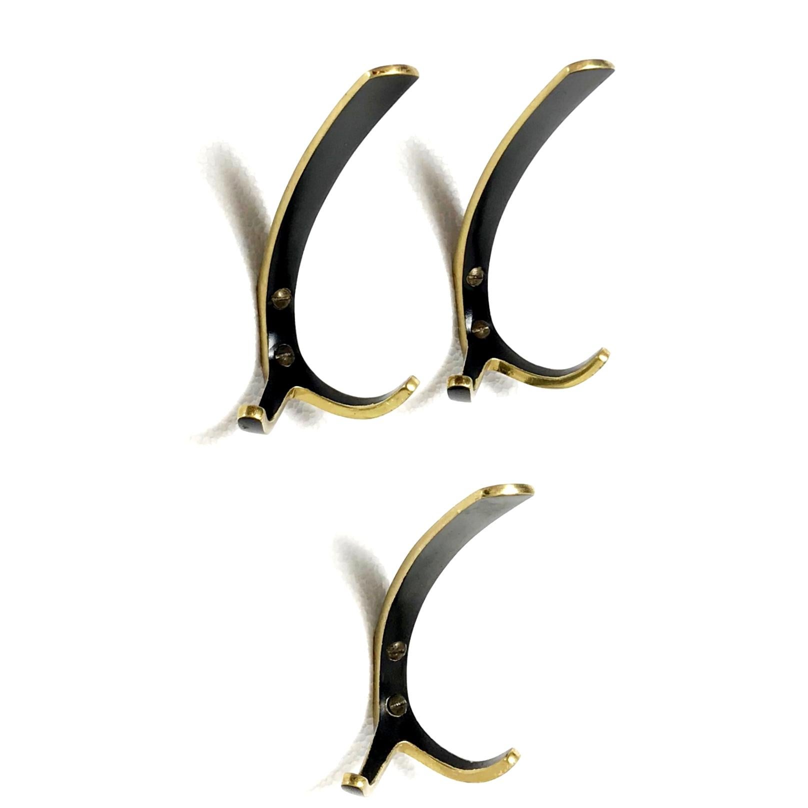 Beautiful Austrian Mid-Century Modern solid brass hooks from the 