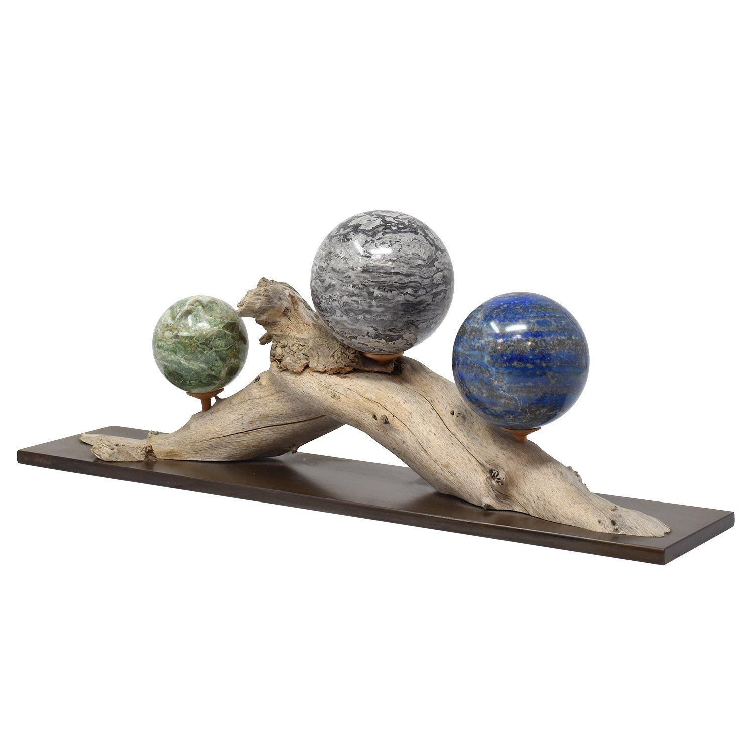 Three Mineral Spheres Custom Mounted On Organic Wood Branch

Chrysoprase, Picasso Jasper, and Lapis Lazuli
Set of 3 as pictured
Diameters from left to right: 2.25, 3.25, 3 in. / 6, 8, 7.5 cm

This sculpture juxtaposes the rich colors and textures of