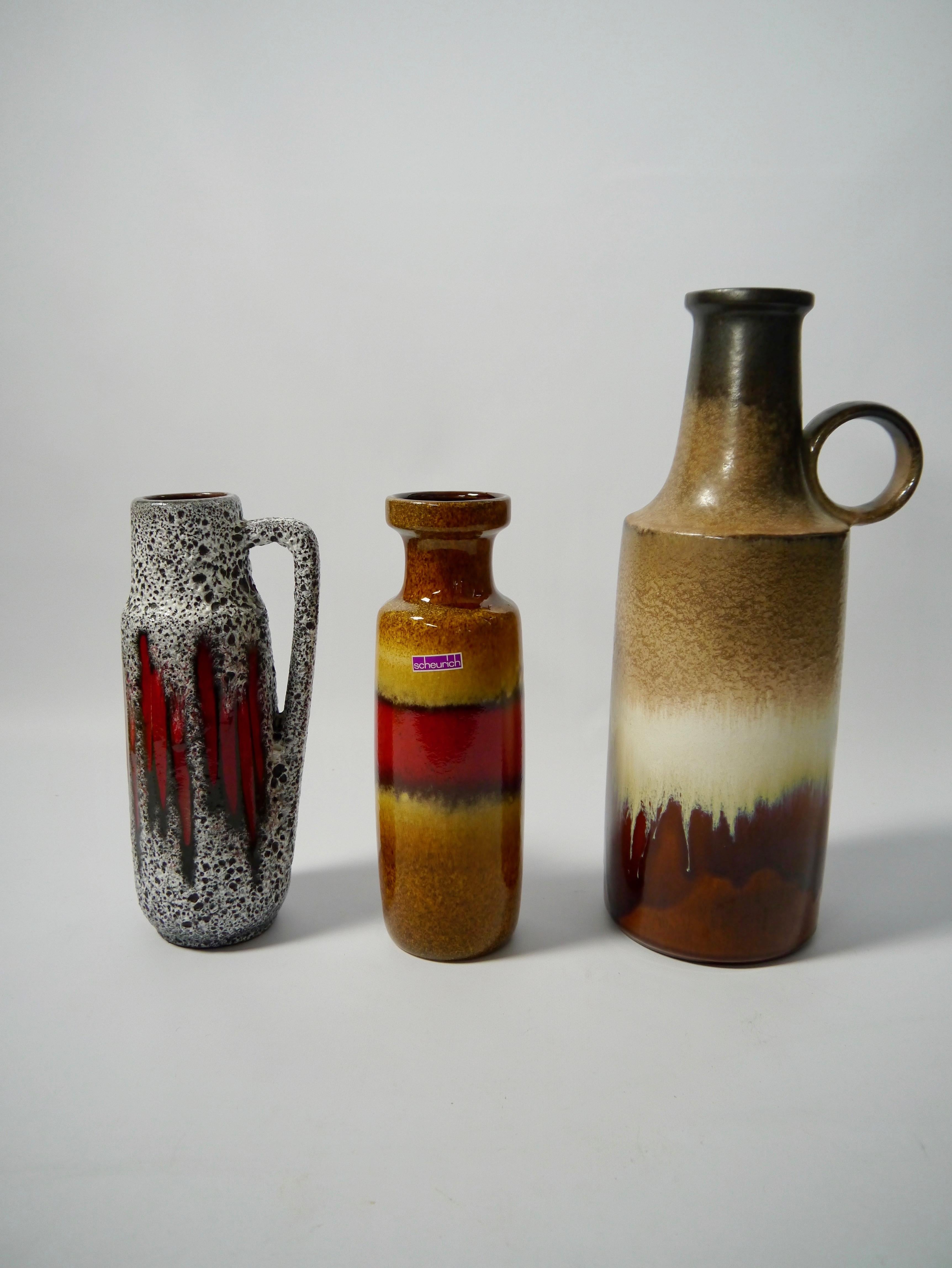 Three mis-matching fat lava vases fabricated in West Germany in the 1960s.