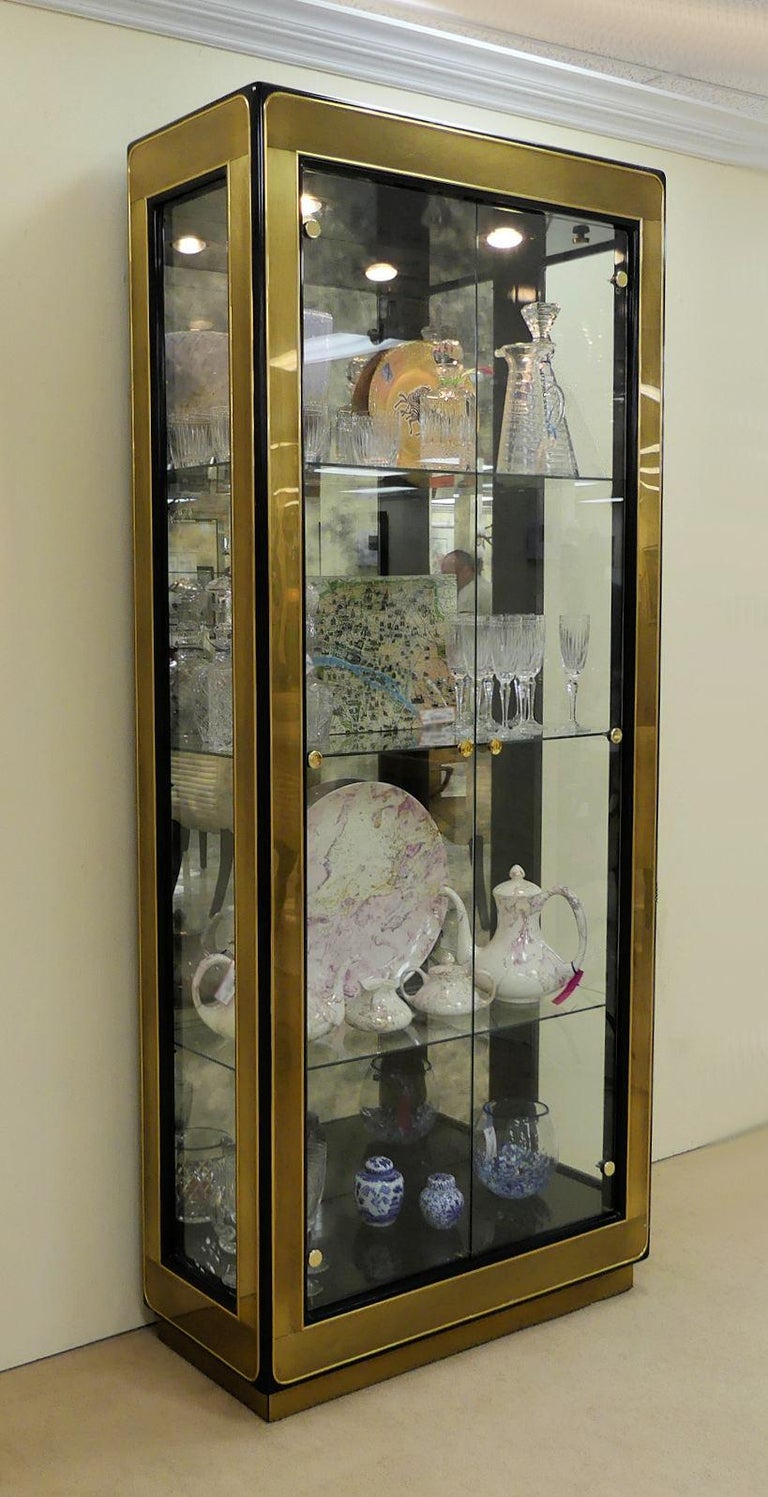 Two Modern Black Lacquered Brass Curio Display by Mastercraft
