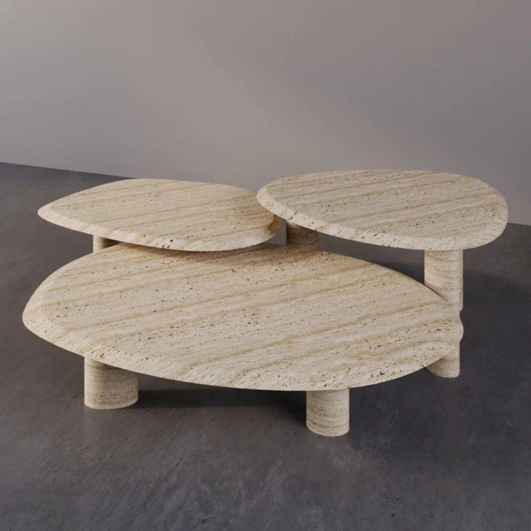The Three Musketeers Marble Coffee Tables represent an exquisite fusion of artistry and nature, embracing the delicate essence of organicism. These tables give rise to a vision of unparalleled beauty, reshaping our understanding of stone. They