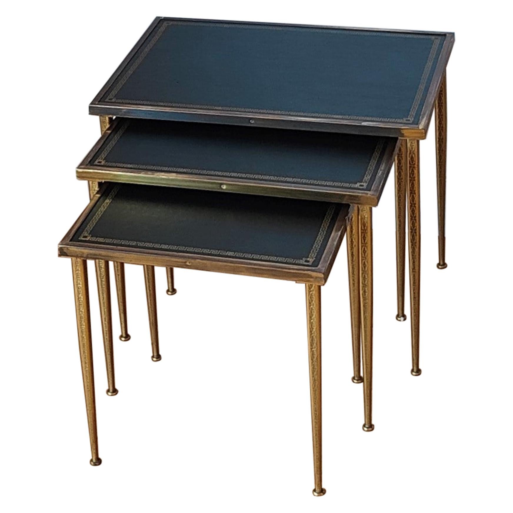 Stacking tables in the style of Jansen
Feet are elegantly engraved and in very good vintage condition
Leather top is also in good vintage condition and feature gold color frise on the rim
these tables will ship from France
Price does not include
