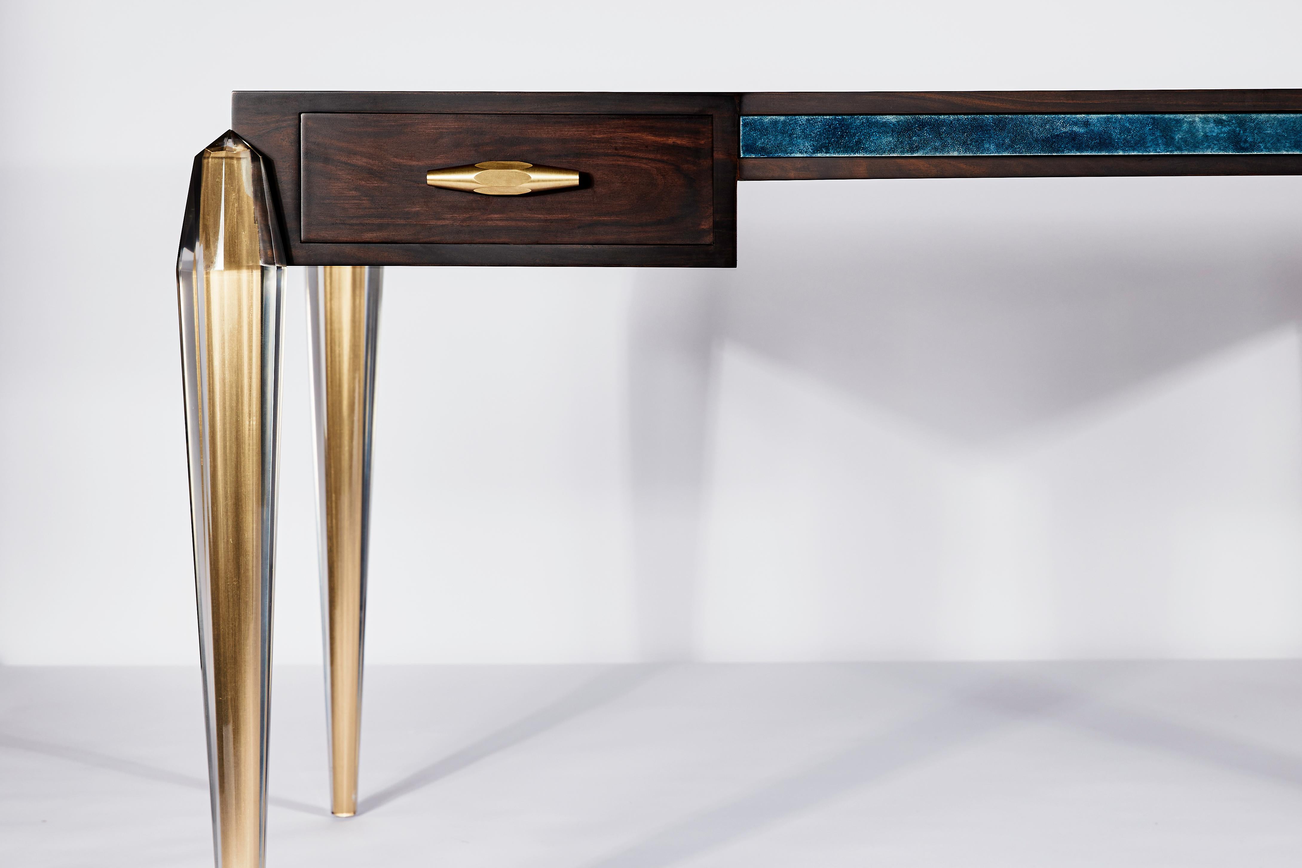 A modern and unique take on a Louis XV writing desk that Jacques-Emile Ruhlmann reworked in 1920’s Paris. Fossilised is an homage to work of both periods and ormolu in particular. Here, the brass is cast in resin like a piece of amber, forever