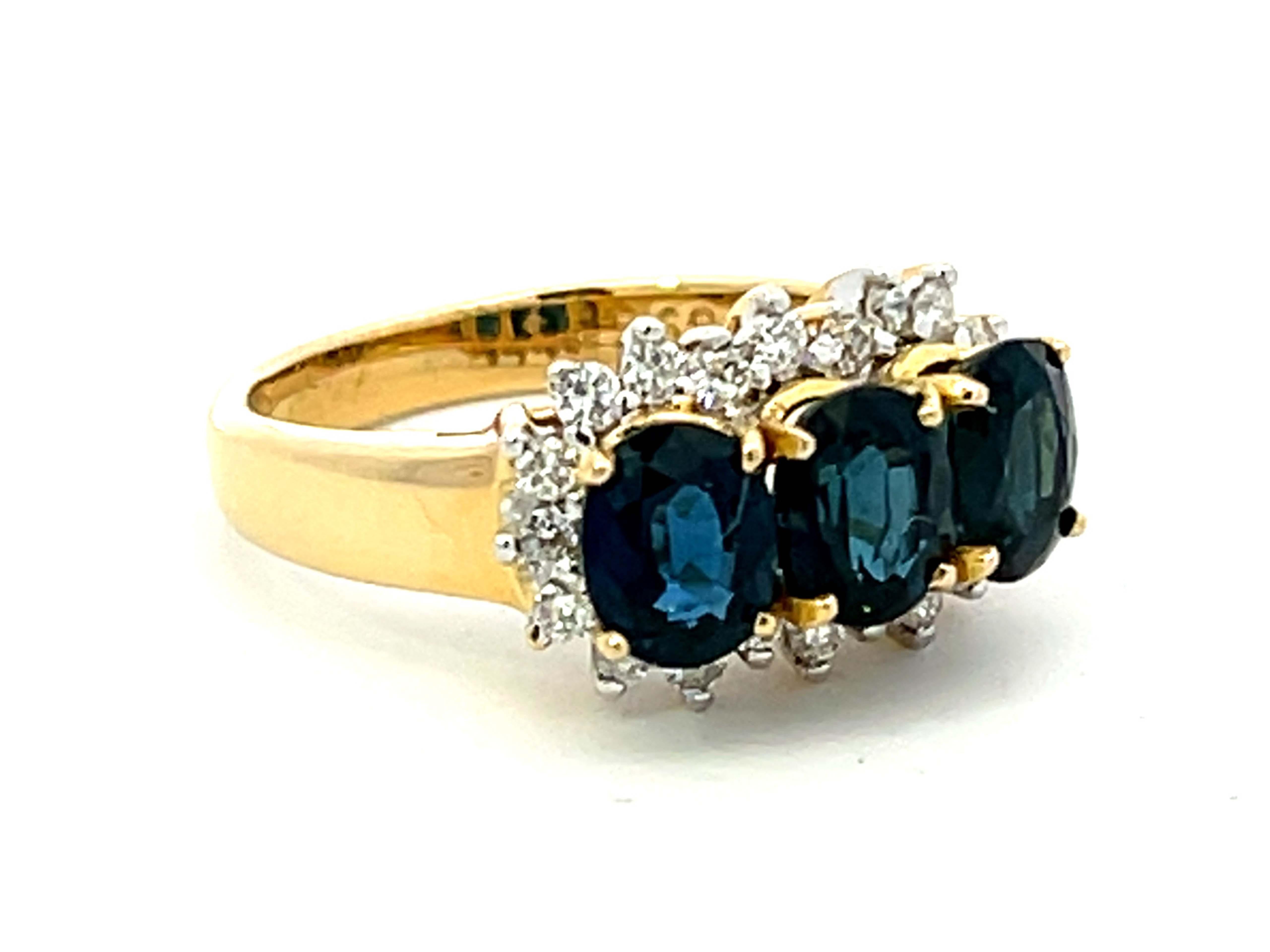 Oval Cut Three Oval Blue Sapphire and Diamond Ring in 18K Yellow Gold For Sale