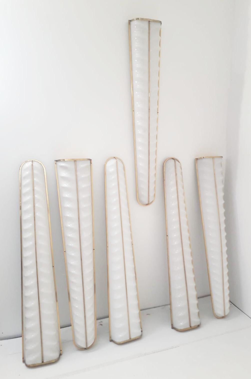 Oversized Italian midcentury wall lights with frosted white chevron patterned acrylic shades mounted on brass frame / designed by Stilux / Made in Milan Italy, circa 1950s
Newly rewired with LED strips
Measures: Height 51 inches, width 10 inches,