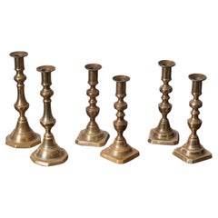 Tre coppie di candelieri in ottone, XIX secolo