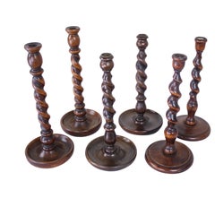 Three Pairs of English Oak Barley Twist Candlesticks