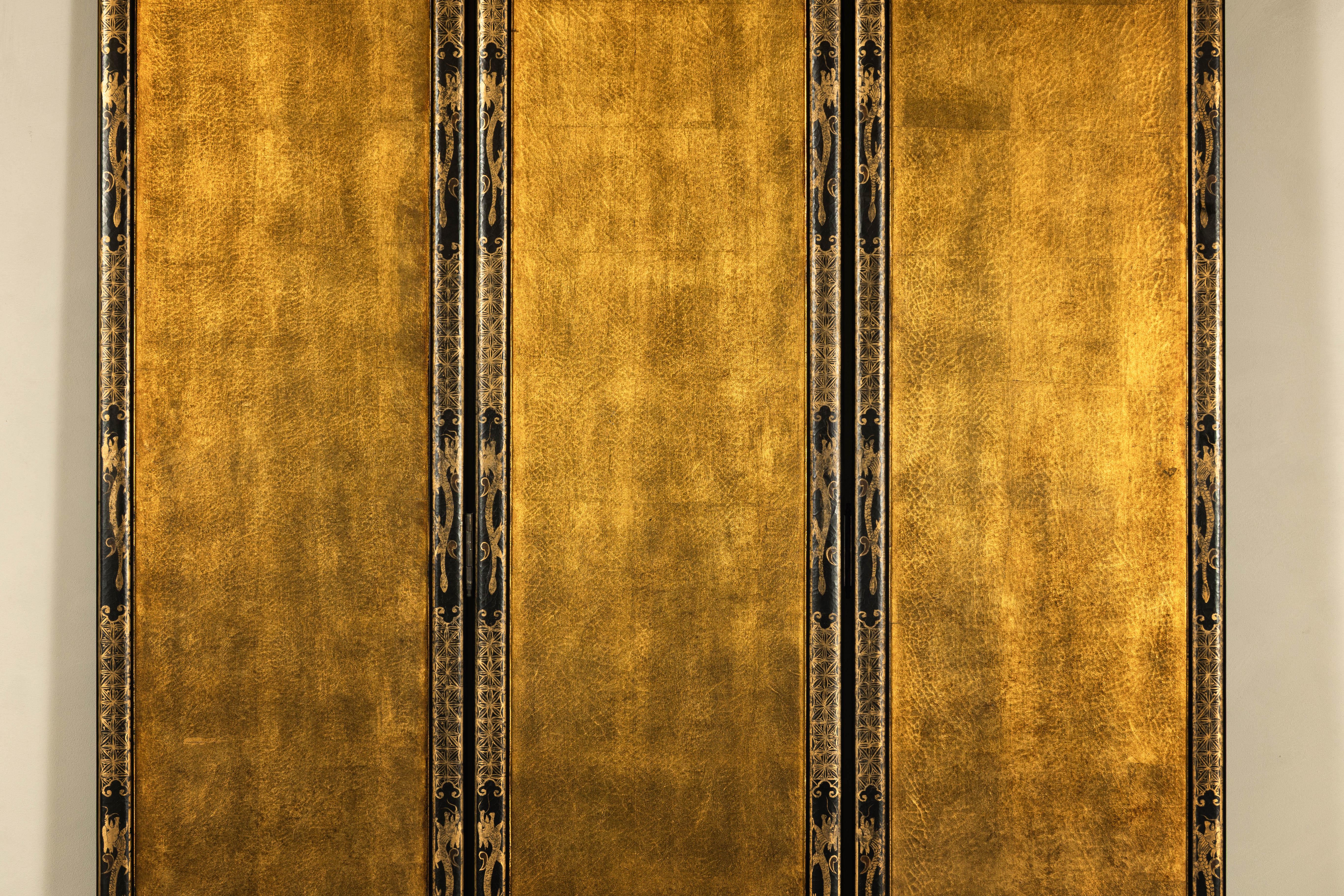 20th Century Three-Panel Black Lacquered and Gold Screen with Flowers and Calligraphy For Sale