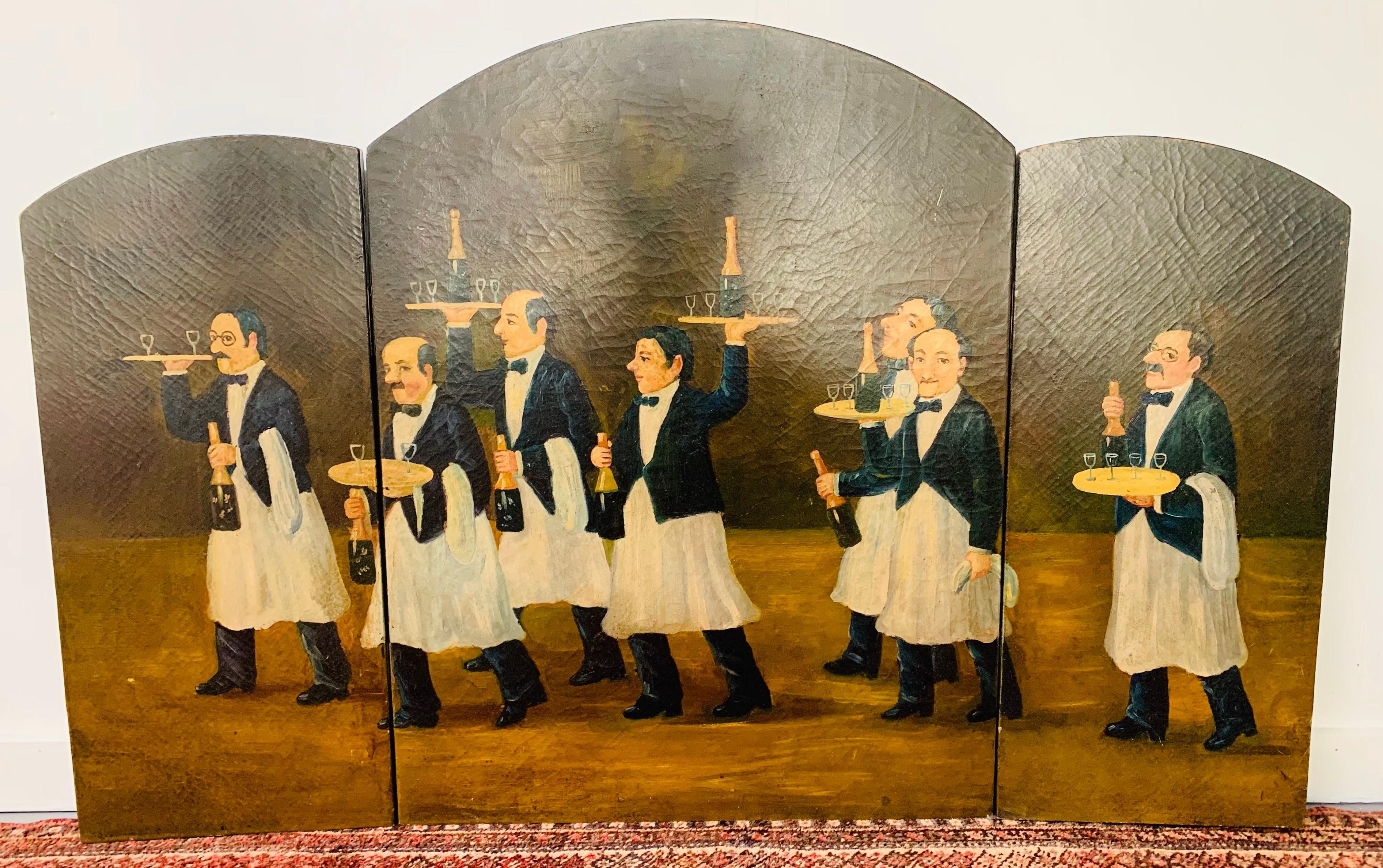 This lovely three panel folding fireplace screen is hand painted on wood. The screen features a scene of a group of men waiters in a high-end Steak House or restaurant serving bottles of champagne. 

This screen will definitely set the mood in
