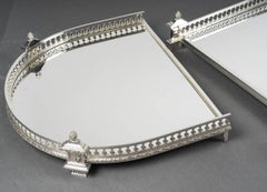 Three-part table centrepiece with a mirrored base and gallery, Late 19th century