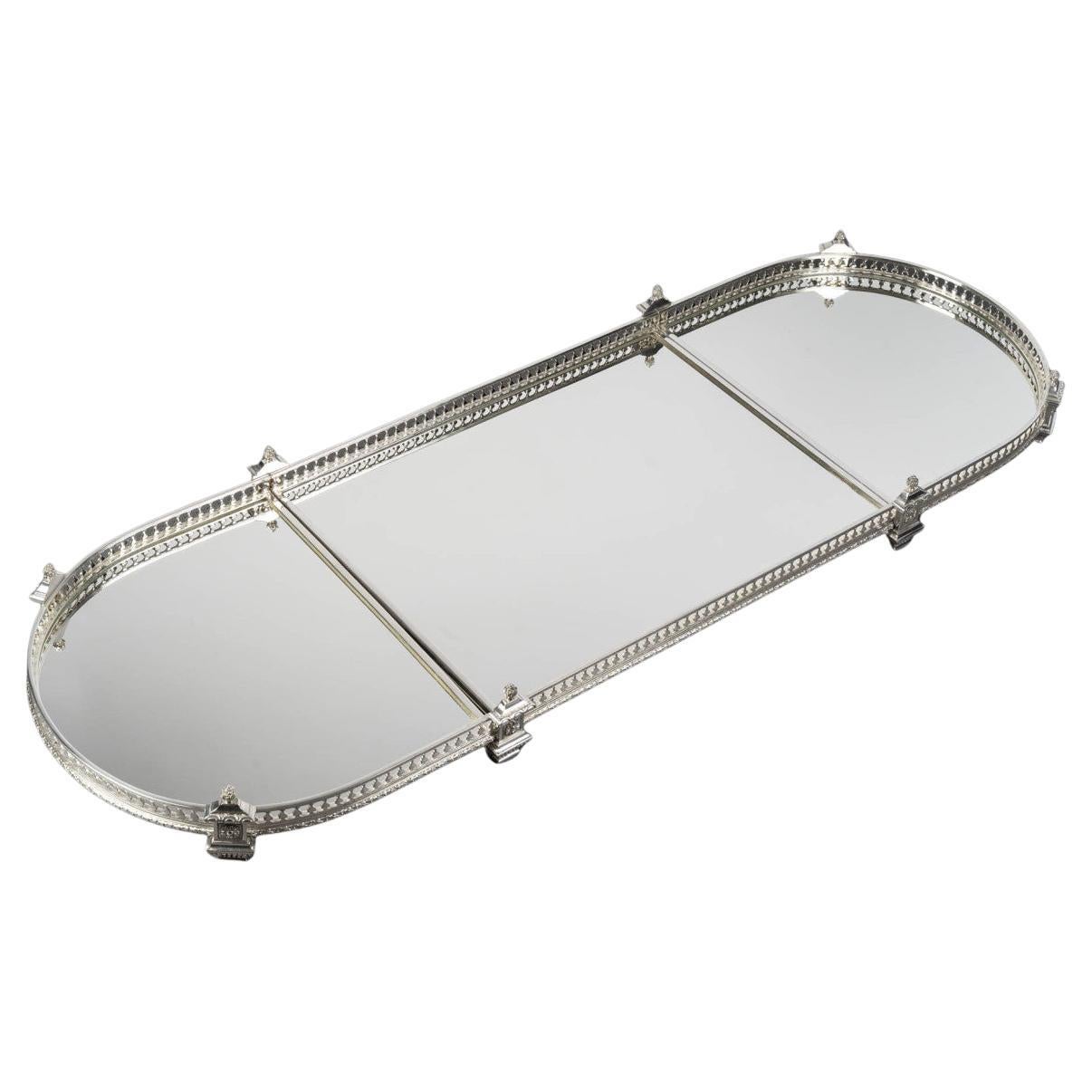 Three-part table centrepiece with a mirrored base and gallery, Late 19th century