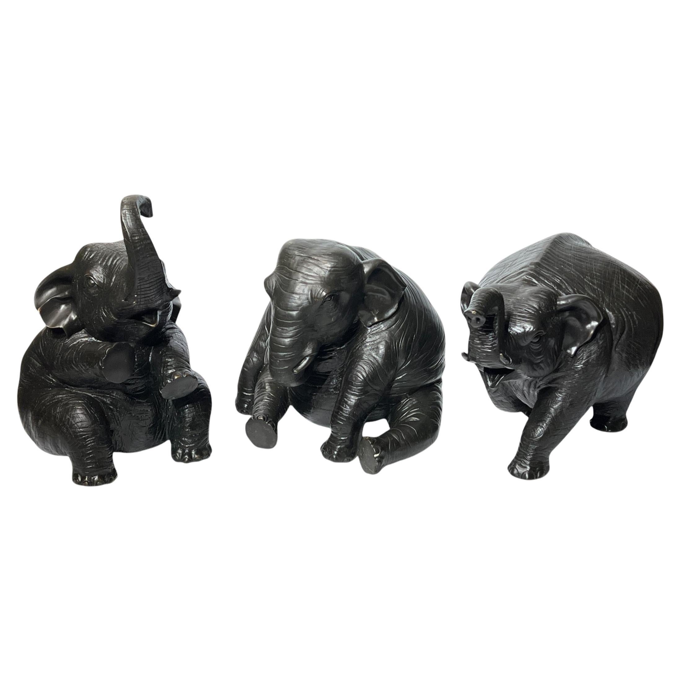 Three Patinated Bronze Elephant Sculptures
