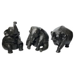 Three Patinated Bronze Elephant Sculptures