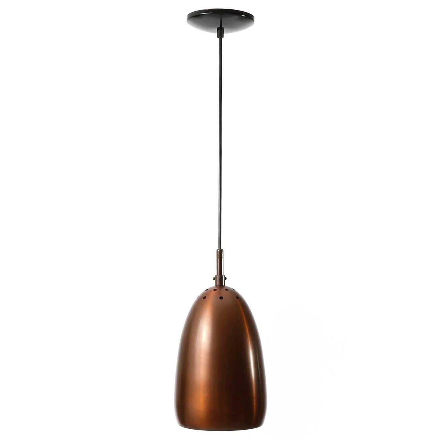 A set of three pendants with wonderful warm natural aged patina made of massive copper.
Very likely manufactured in Italy in midcentury, circa 1960 (late 1950s or early 1960s).
Each lamp has one socket for a medium or standard screw base