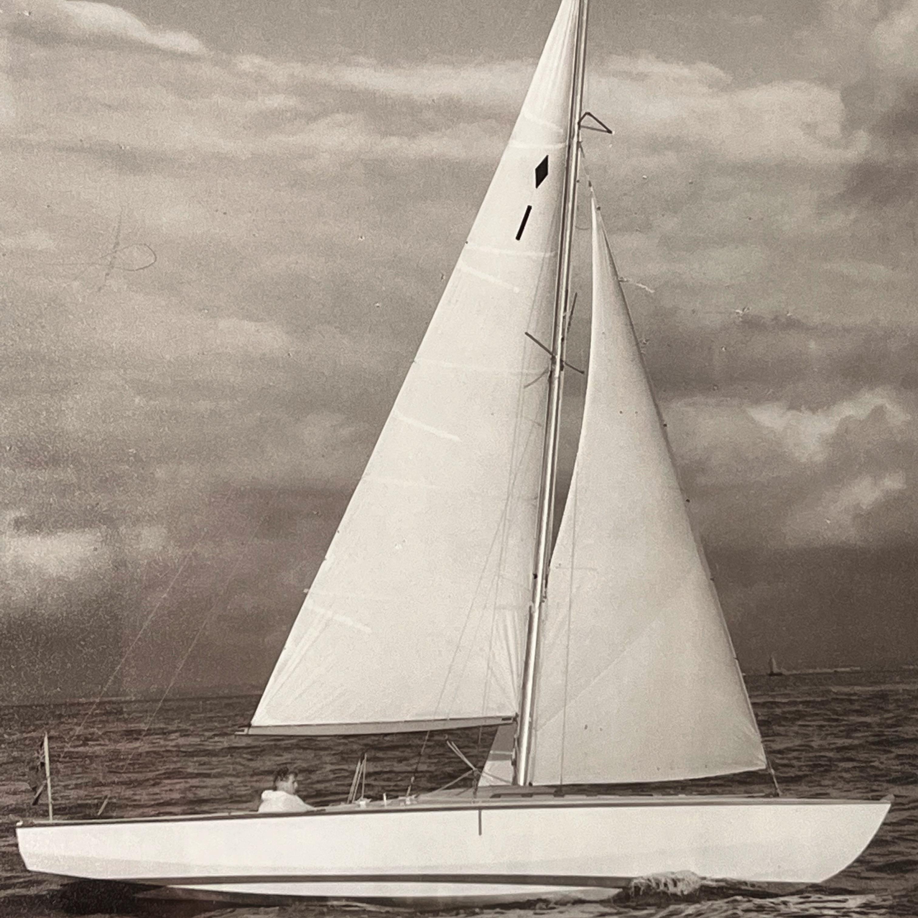 Three charming perspectives of sail boat Zest, each signed Beken and Sons of Cowes, sepia toned gelatin silverprints, float mounted in box frames.

English, 1950s

H28 cm x W 23 cms (photographs)