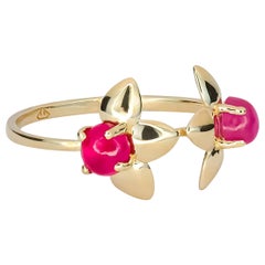 Three petal flower ring with rubies in 14k gold