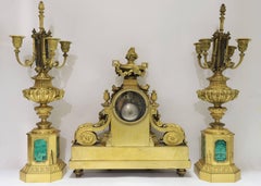 Reloj francés de tres piezas de bronce y malaquita
