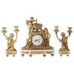 Three-Piece French Bronze and Marble Clock Garniture, circa 1875