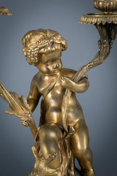 Three-Piece French Bronze and Marble Clock Garniture, circa 1875