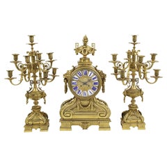 Reloj francés de bronce dorado de tres piezas