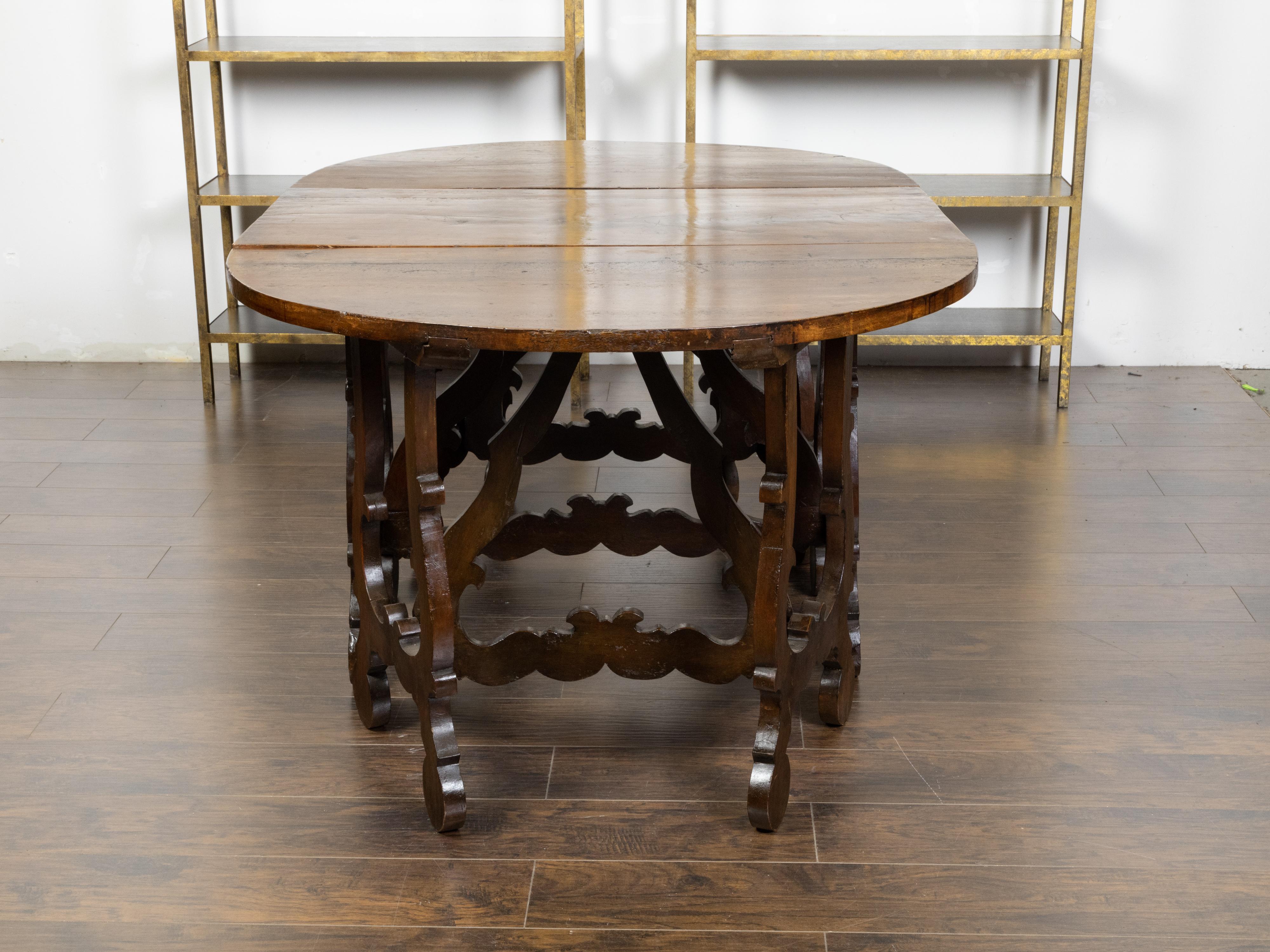 19th Century Three-Piece Italian Baroque Style Oval Top Table with Carved Lyre Shaped Legs For Sale