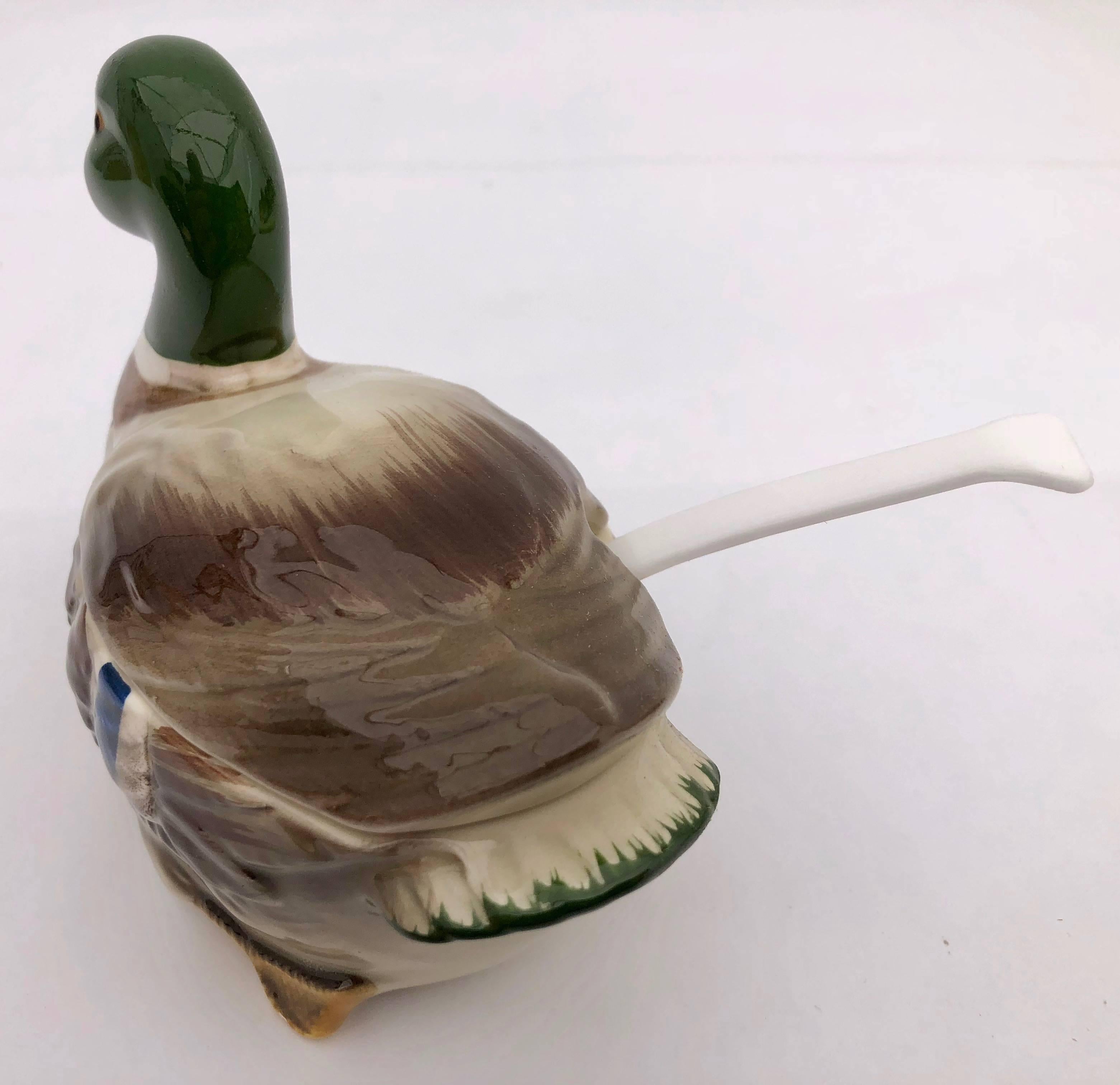 This is a handcrafted ceramic Mallard condiment bowl, by Otagiri, Japan. It was purchased for a French restaurant, but never used. The hand painted colors are vibrant. this would add a wonderful touch to any table. We have 7 of these and are selling
