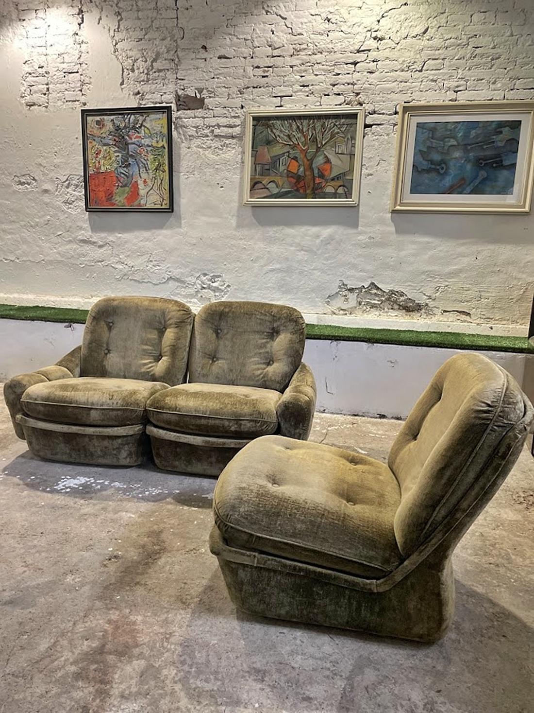 This rare three-piece modular lounge set captures the essence of European furniture design in the 1970s—a period when designers embraced softer, organic forms and elevated comfort as a central aesthetic principle. The generously rounded shapes, deep