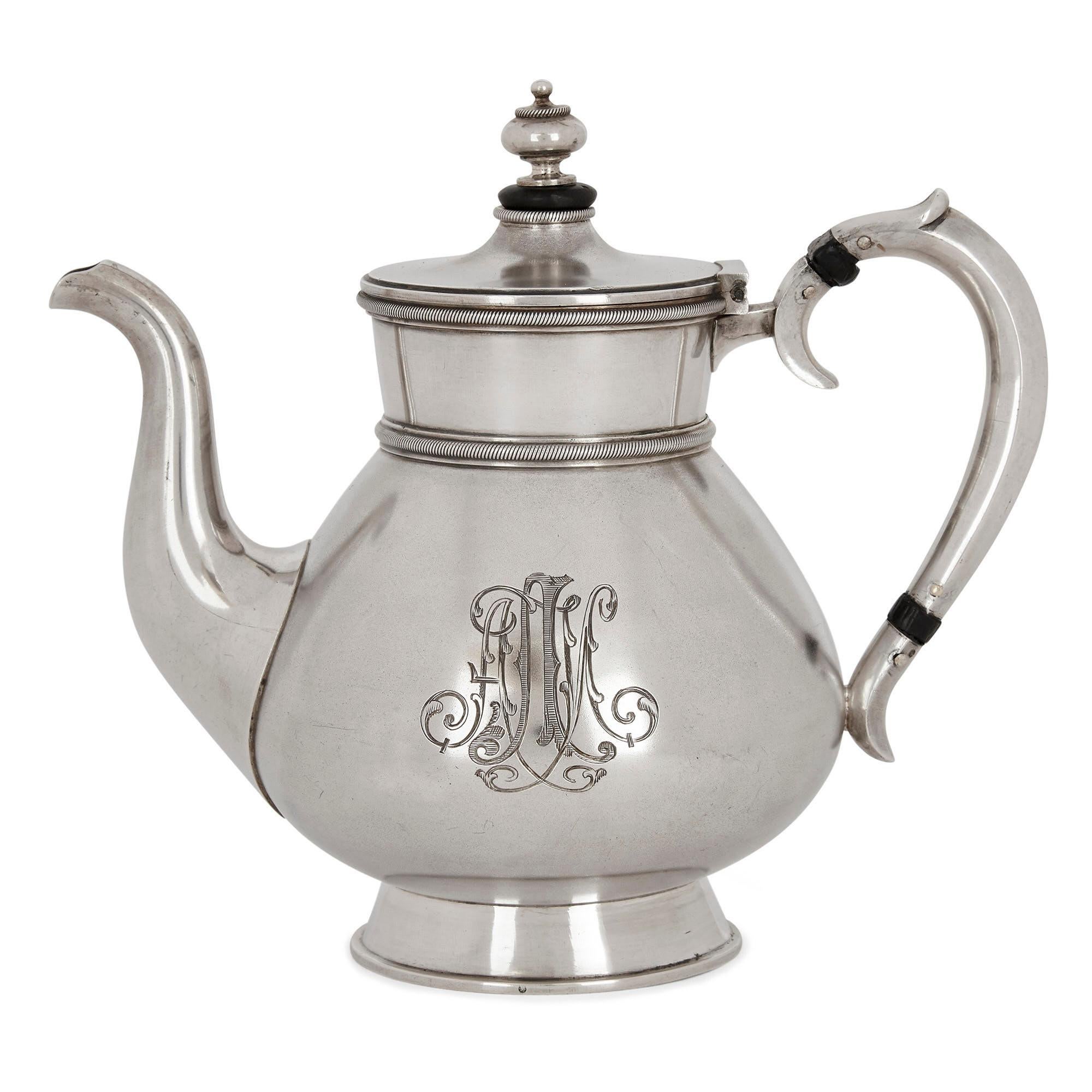 Three-piece Russian silver tea set
Russian, circa 1890
Measures: Teapot: Height 17cm, width 20cm, depth 12cm
Creamer: Height 11cm, width 14cm, depth 9cm

This superb set is crafted from fine silver in the elegant Russian Neoclassical style. The