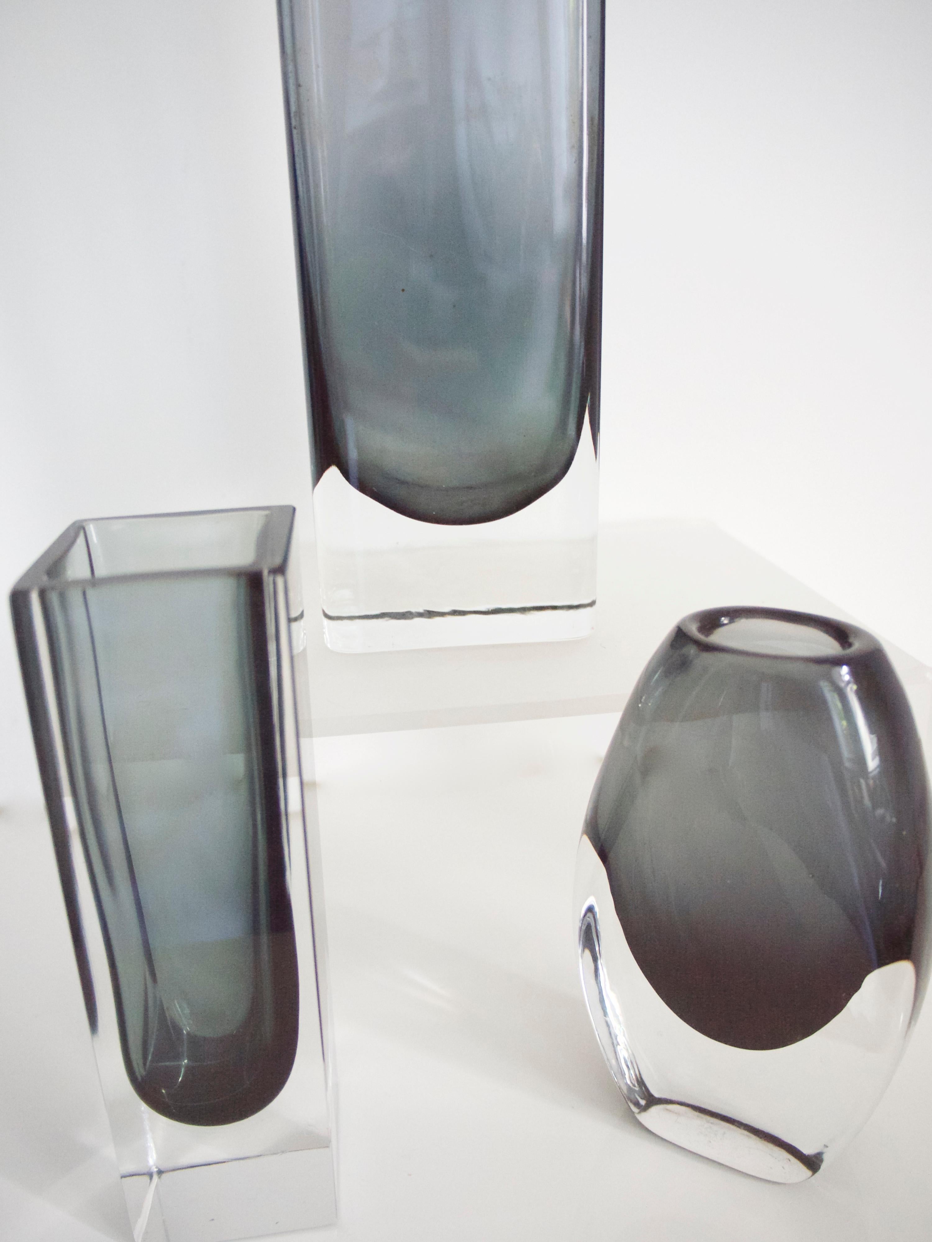 Vintage three piece collection Scandinavian Modern  Smoked Glass from Gunnar Anders for Lindshammer and Kaj Franck for Nuutajarvi

Measures: Large block vase 
Height 21 cms, width 7 cms, depth 4 cms
Weight 0.706 kgs

Small black block vase
Height 14