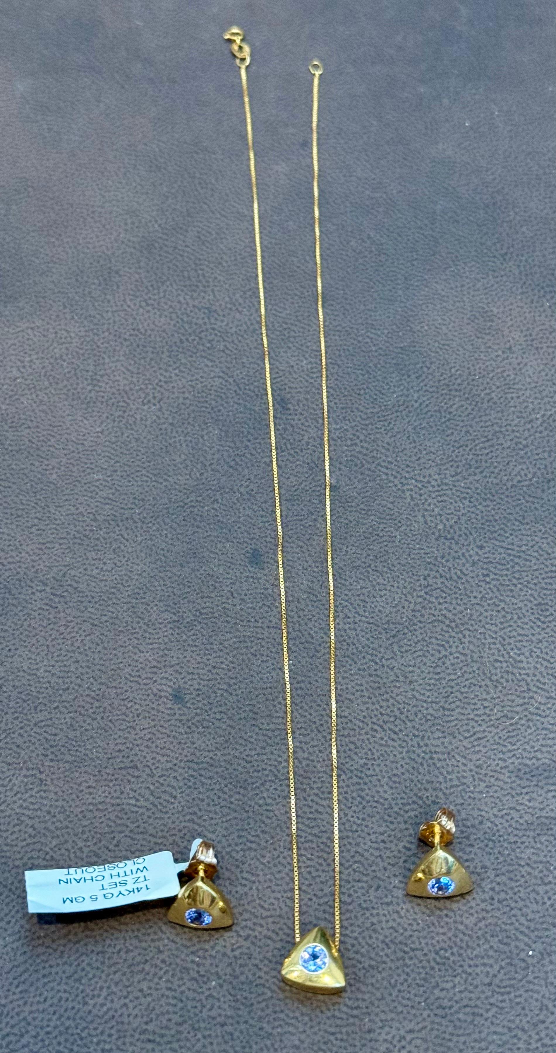 Tanzanite trois pièces  Pendentif et boucles d'oreilles  Or jaune 14 carats avec chaîne en vente 6