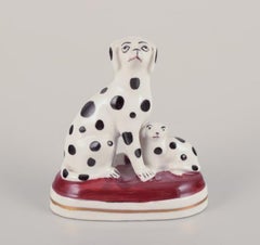 Three pieces of French and English porcelain.