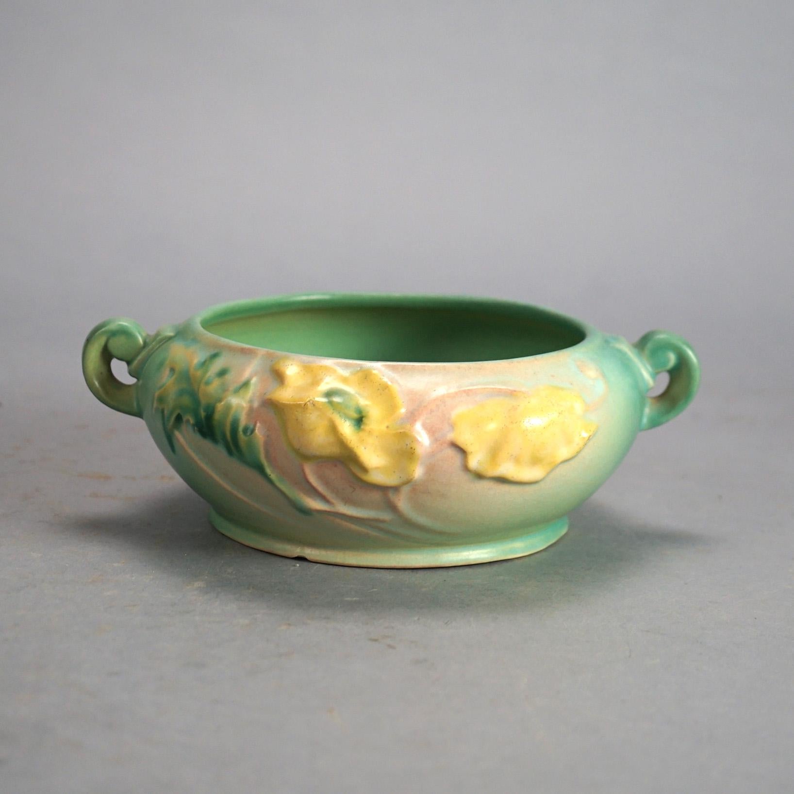 Three Pieces of Green Roseville Art Pottery in Poppy or Ixia Pattern Mid 20thC

Measures - Largest 8 1/2
