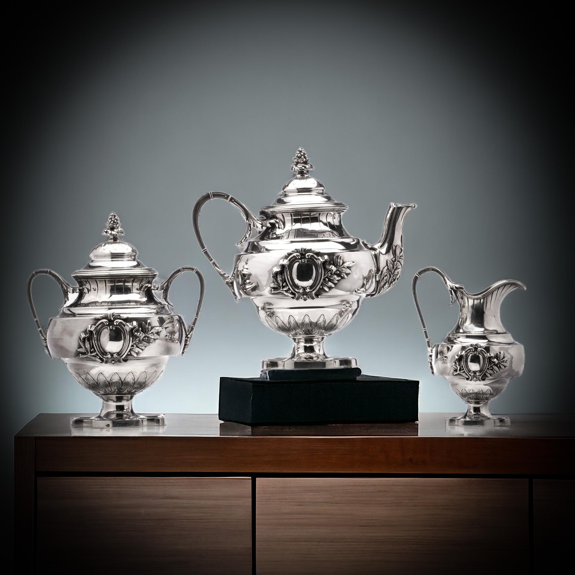 Step into the enchanting world of exquisite craftsmanship with this remarkable Antique French 950 Silver Three-Piece Tea Service Set by the esteemed silversmith Paul Canaux & Cie.
Made in France between 1892 and 1911. 

Paul Canaux & Cie., a name