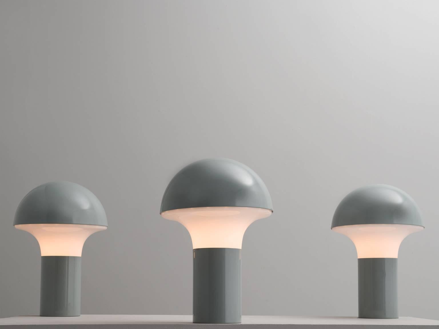 Set of three table lamps, in glass and metal, Italy, 1970s.

This is a set of three frivolous grey almost blue mushroom shaped table lamps. These lights consist of a white coated metal base with an opaline glass shade. Due their form and color