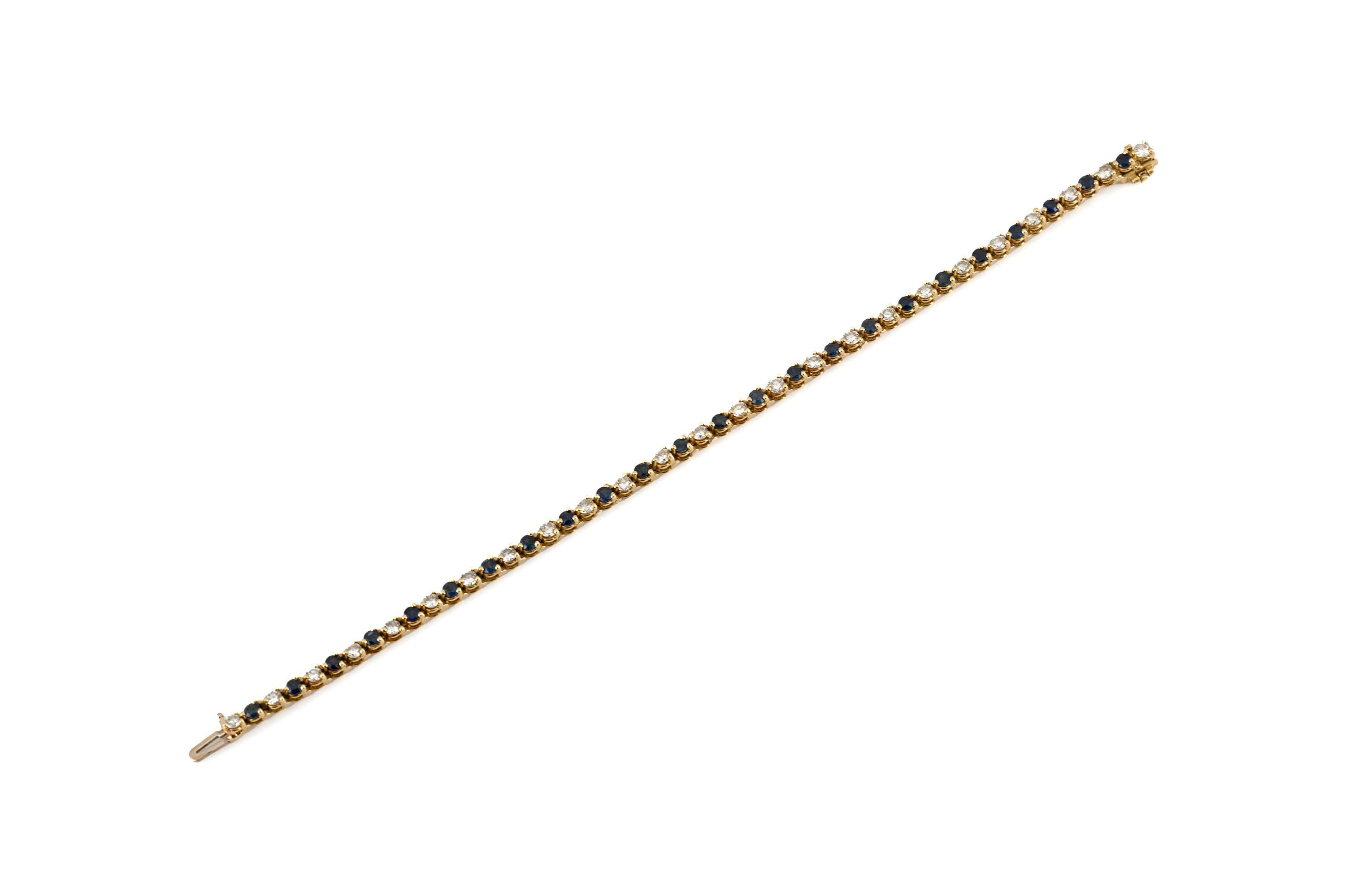The bracelet is finely crafted in 14k yellow gold with sapphire weighing approximately total of 1.30 carat and diamonds weighing approximately total of 1.30 carat.
Circa 1980.