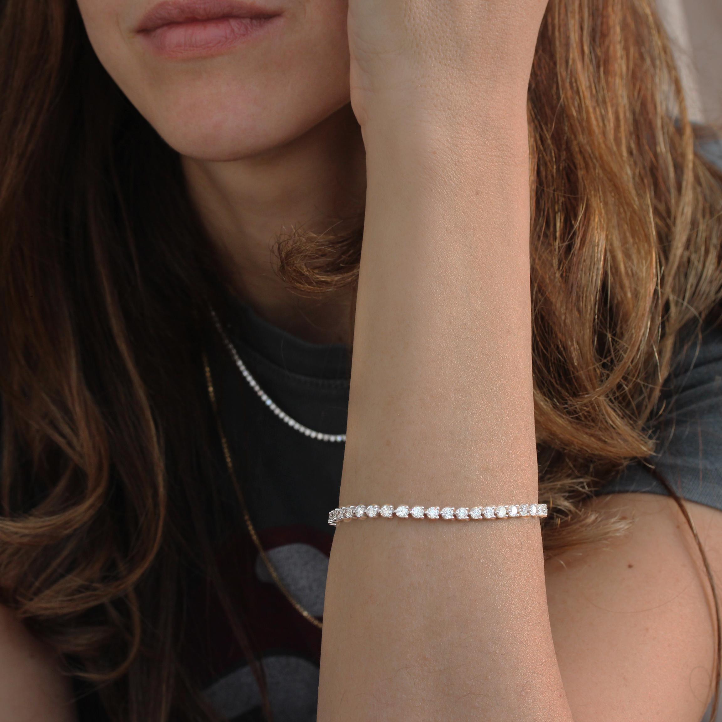 Indulge in understated elegance with our three-prong tennis bracelet. Its minimalist design showcases floating diamonds, each uniquely positioned with a delicate gap between them, allowing a graceful and radiant appearance.
Featuring a total of 7