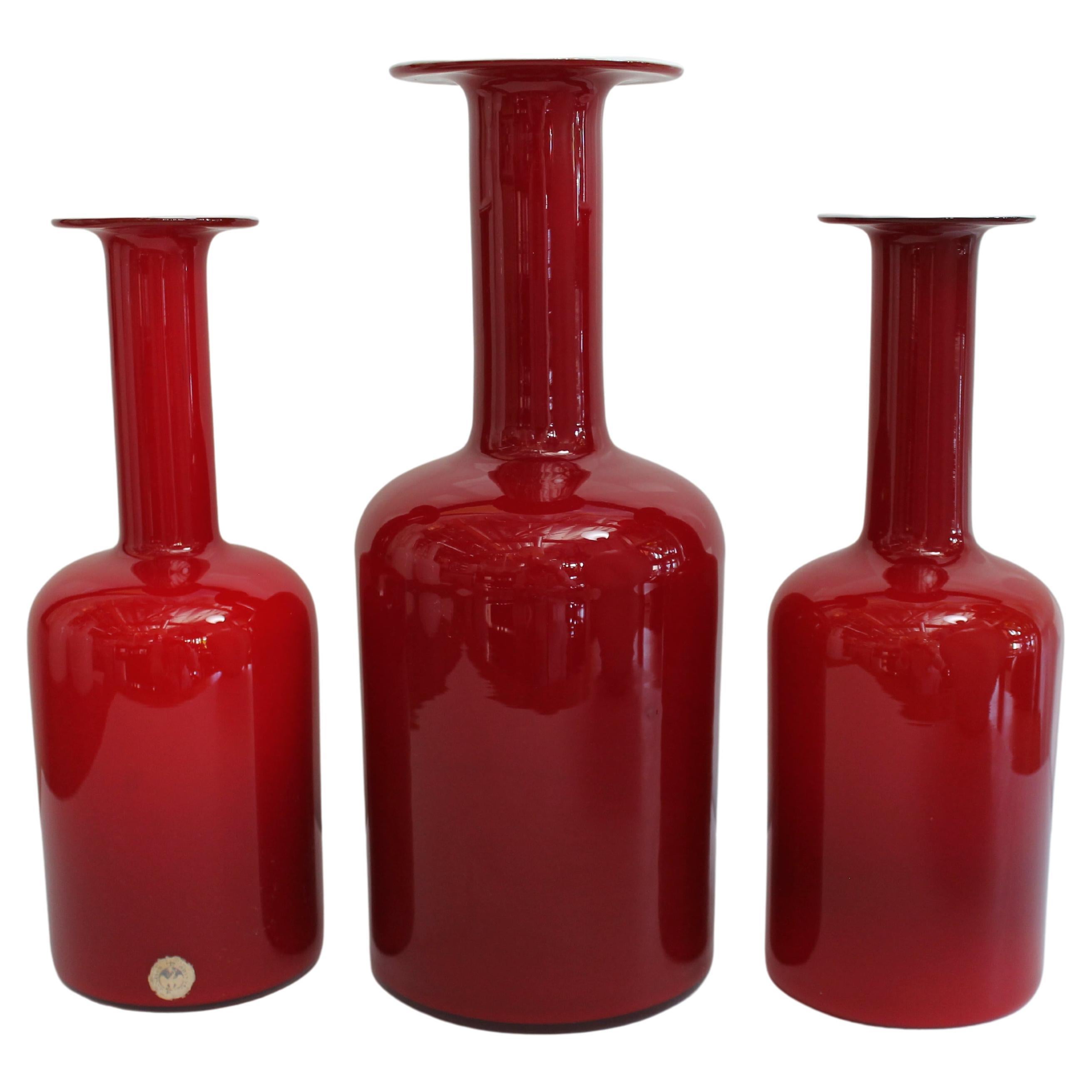 Three Red Bottles by Otto Bauer for Holmegaard, Denmark