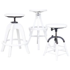 Three Revolving Stools of Varying  Heights