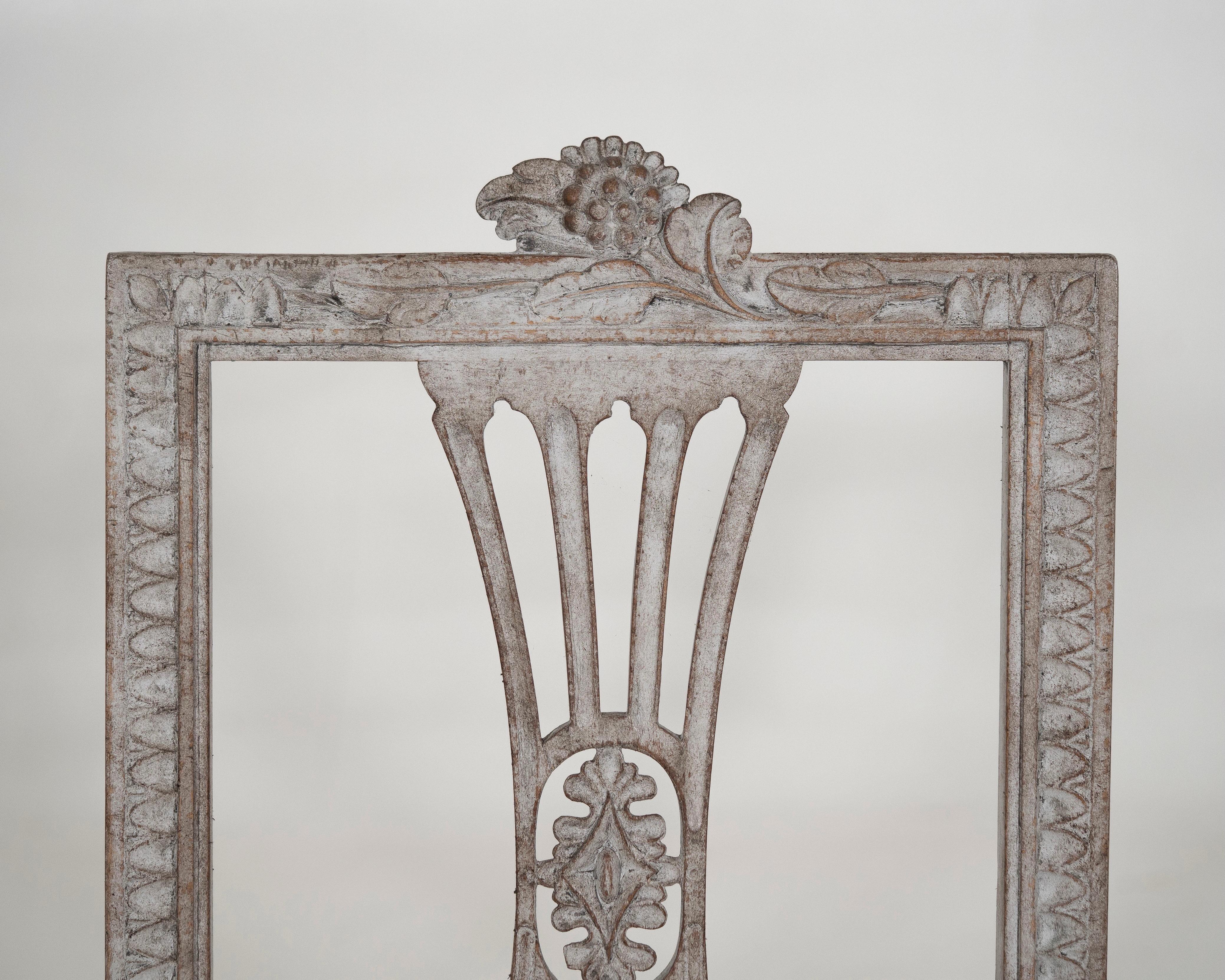 Three richly carved Gustavian side chairs, 18th Century.