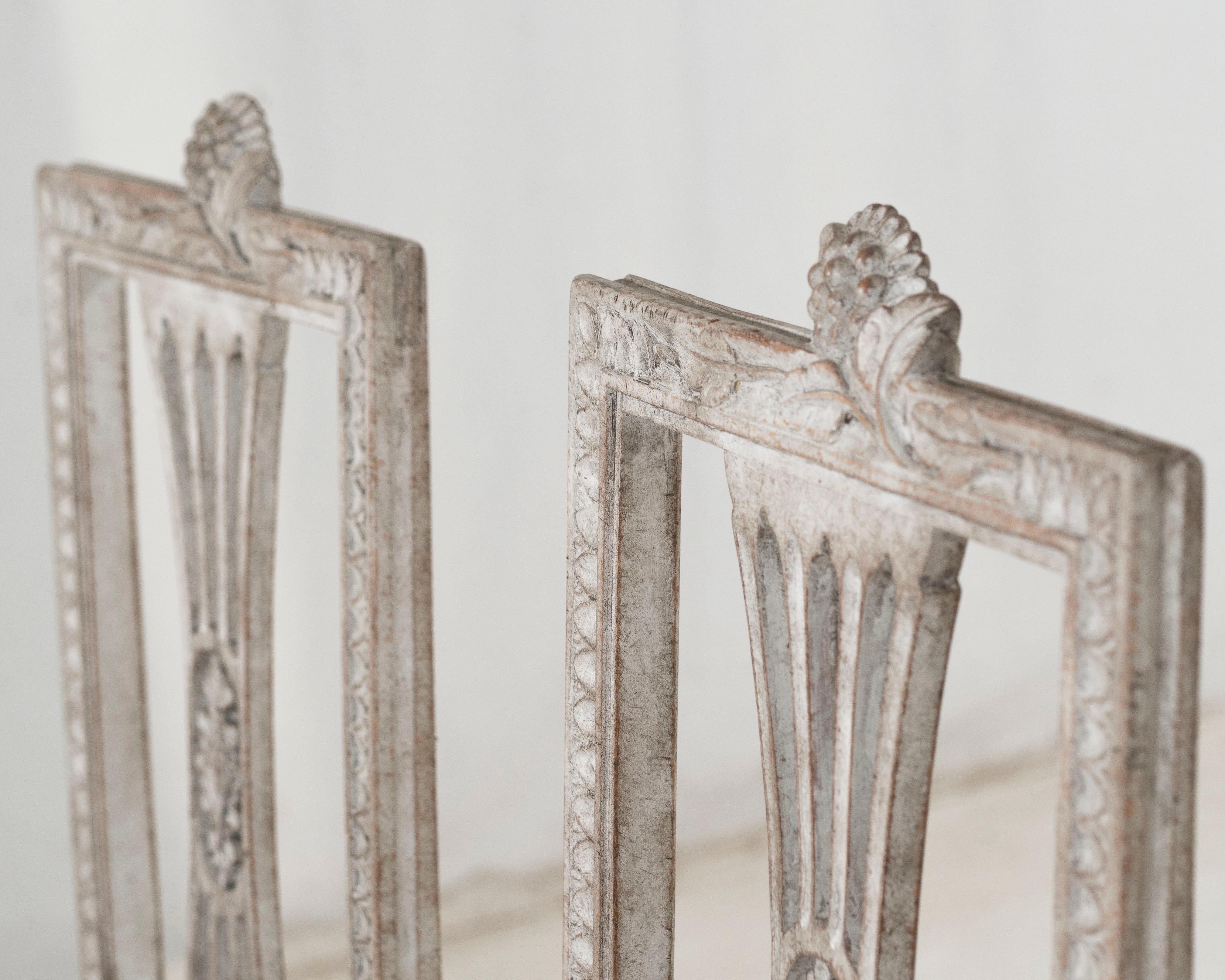 Three richly carved Gustavian side chairs, 18th C. For Sale 1