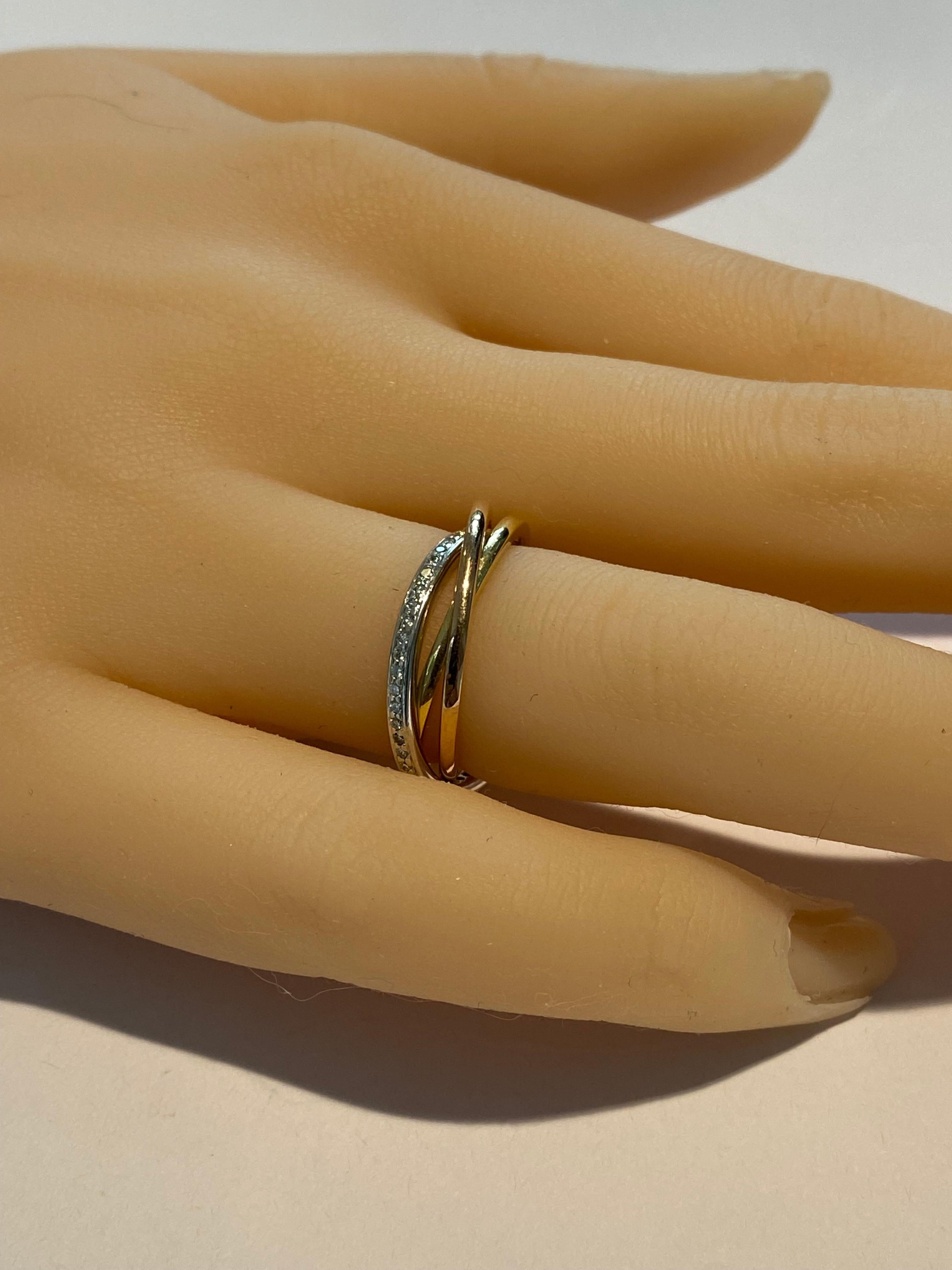 Anillo Tres Rodillos Platino Oro Dieciocho Quilates Diamante 0,52 Quilates Talla 5,5 Corte redondo en venta